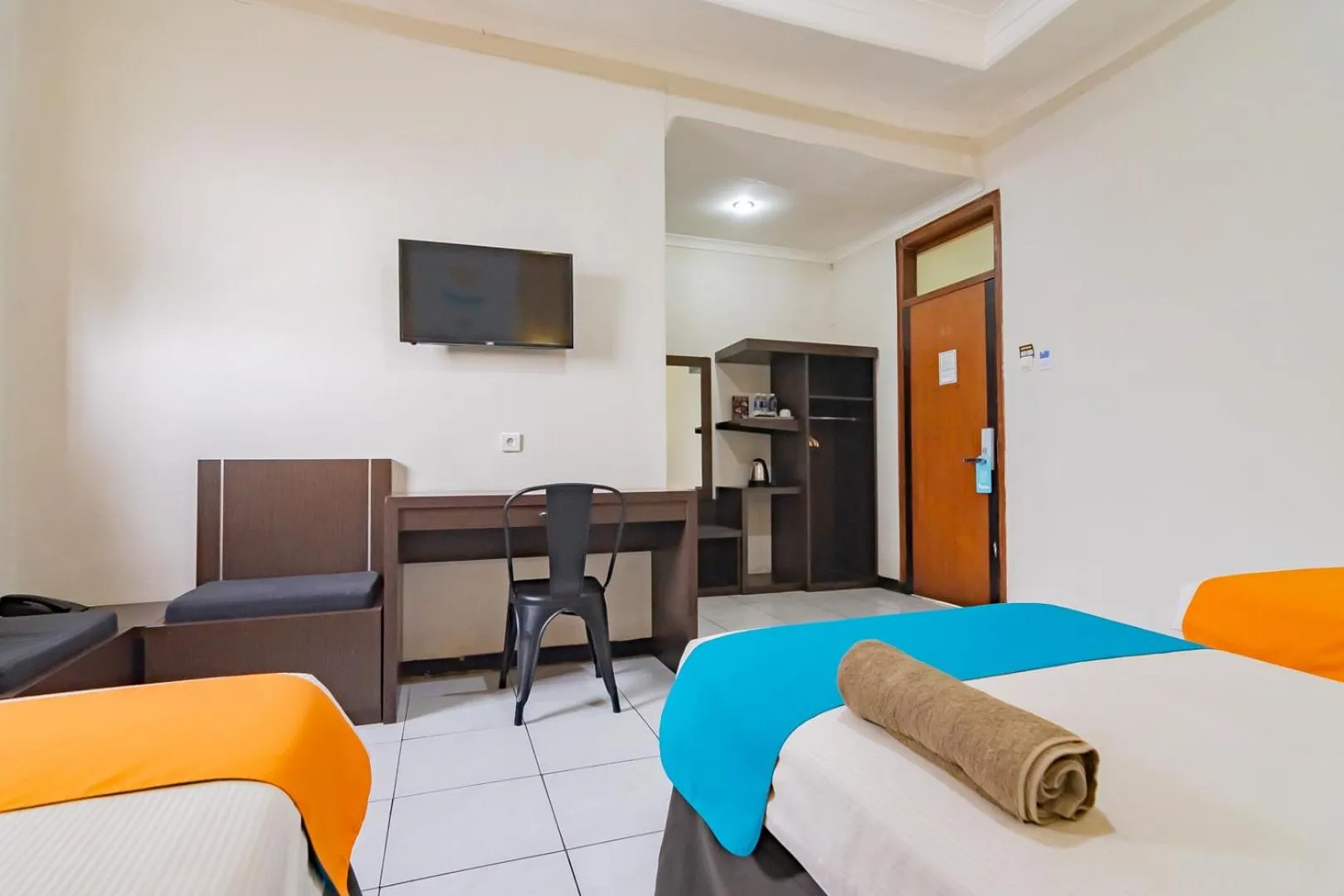 Bedroom in Sans Hotel Cihampelas Bandung