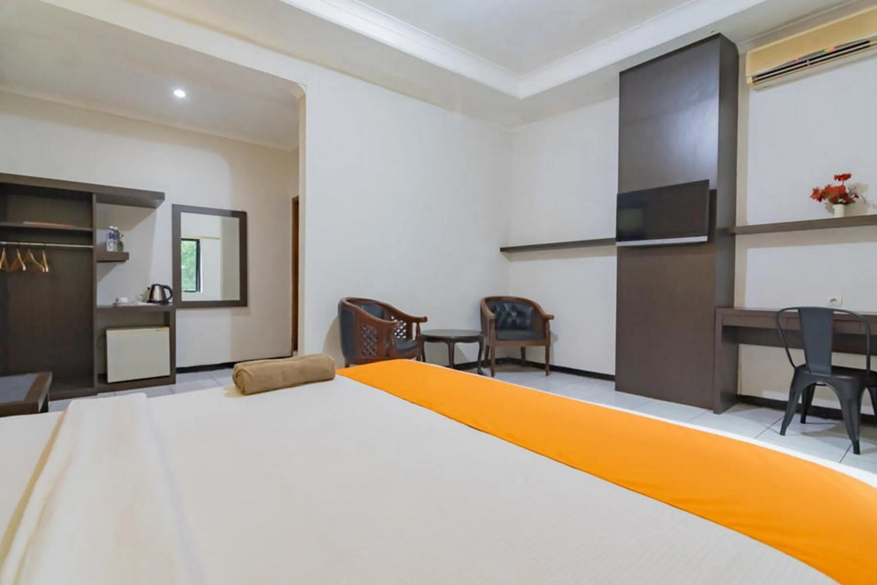 Bedroom in Sans Hotel Cihampelas Bandung