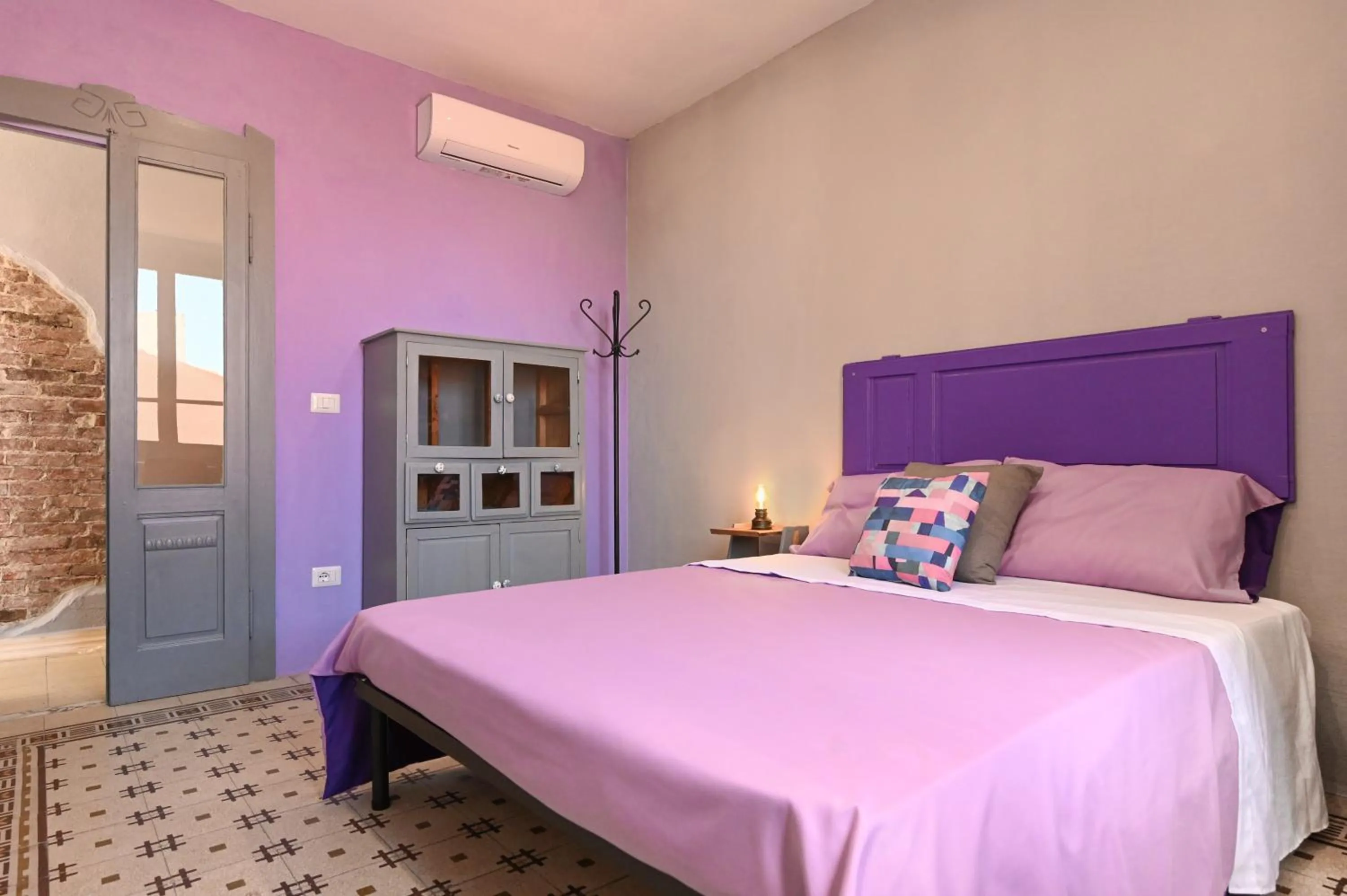 Bed in Urban Blue Guest House