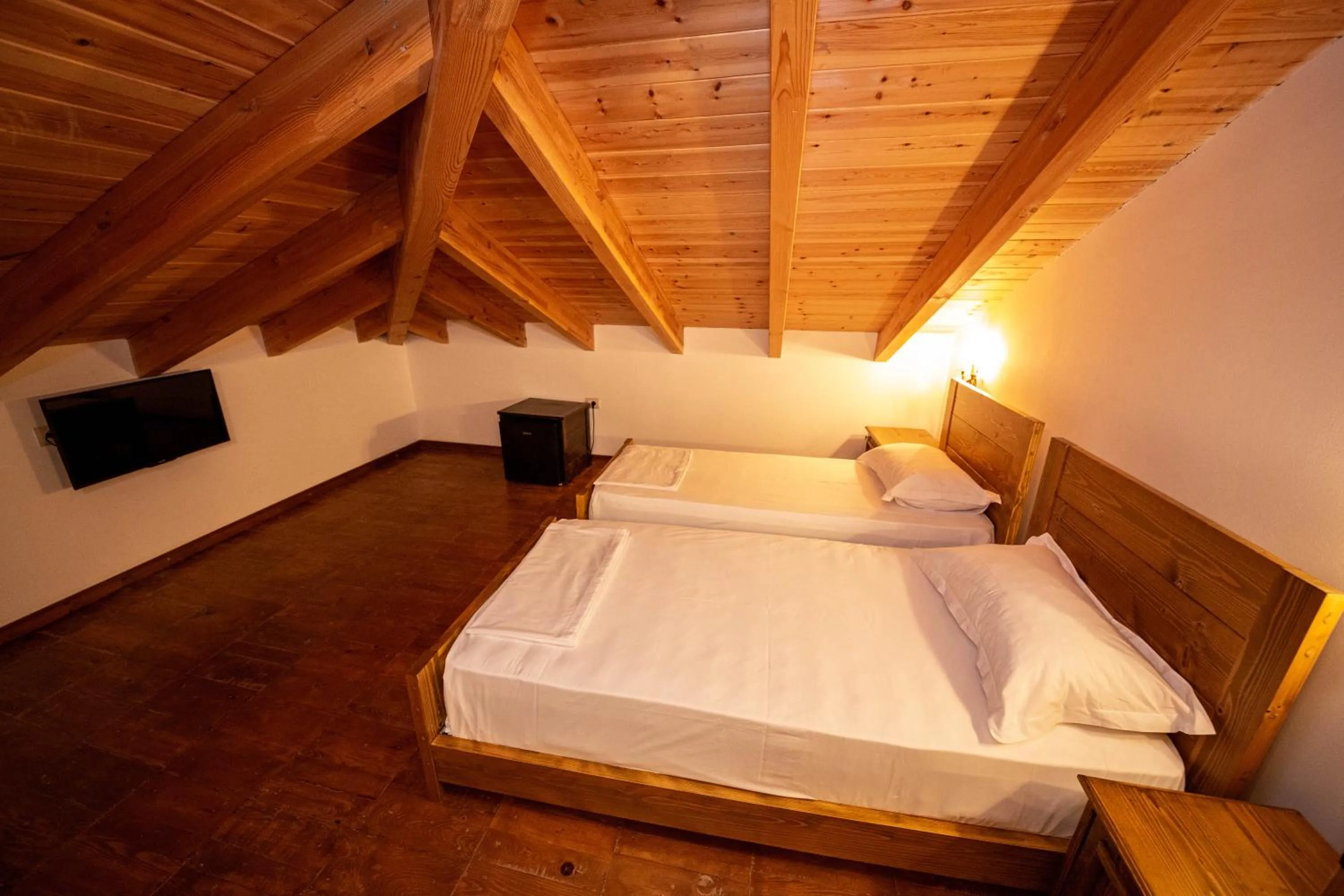 Bed in Berati Castle Hotel