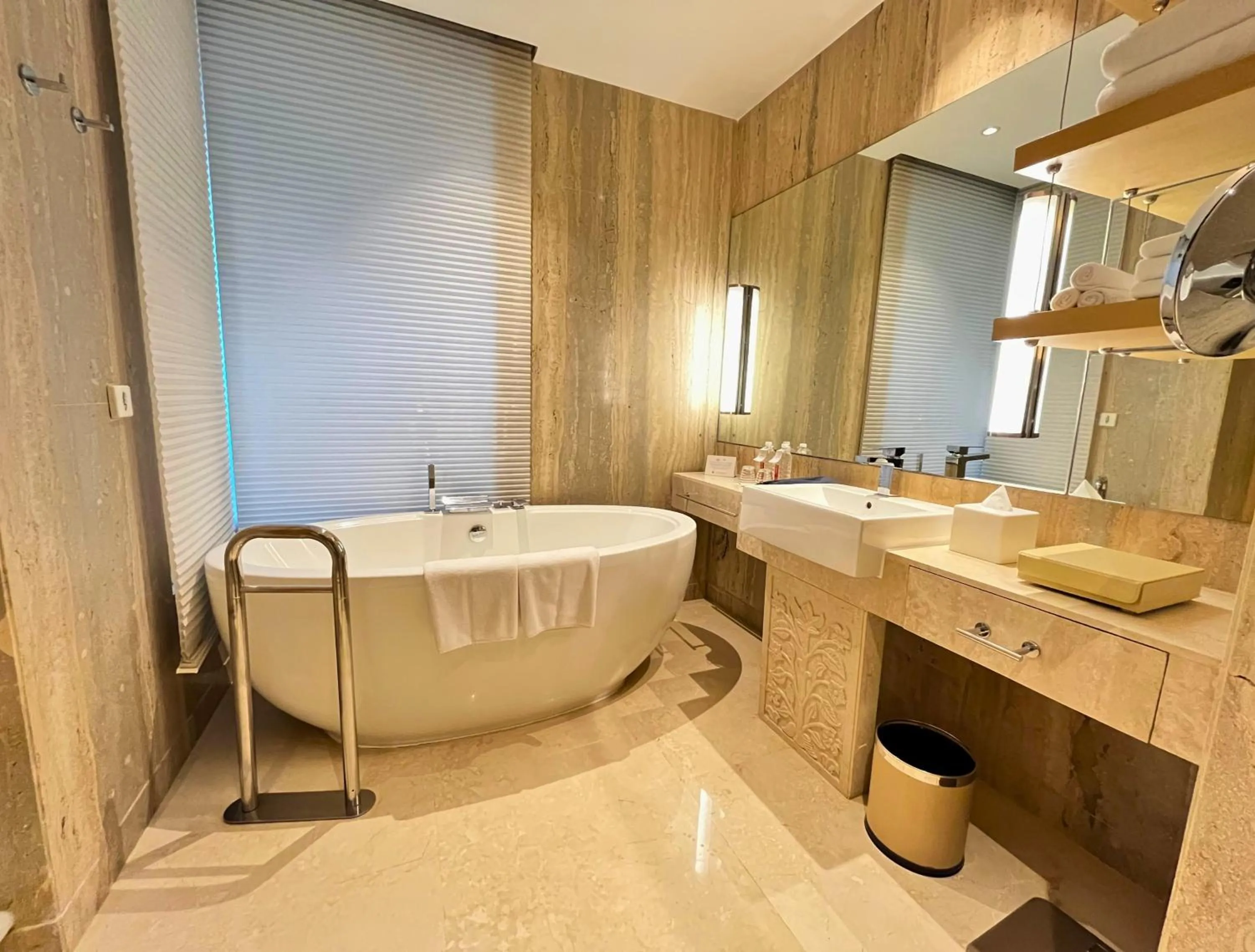 Bathroom in Crowne Plaza Greater Noida by IHG