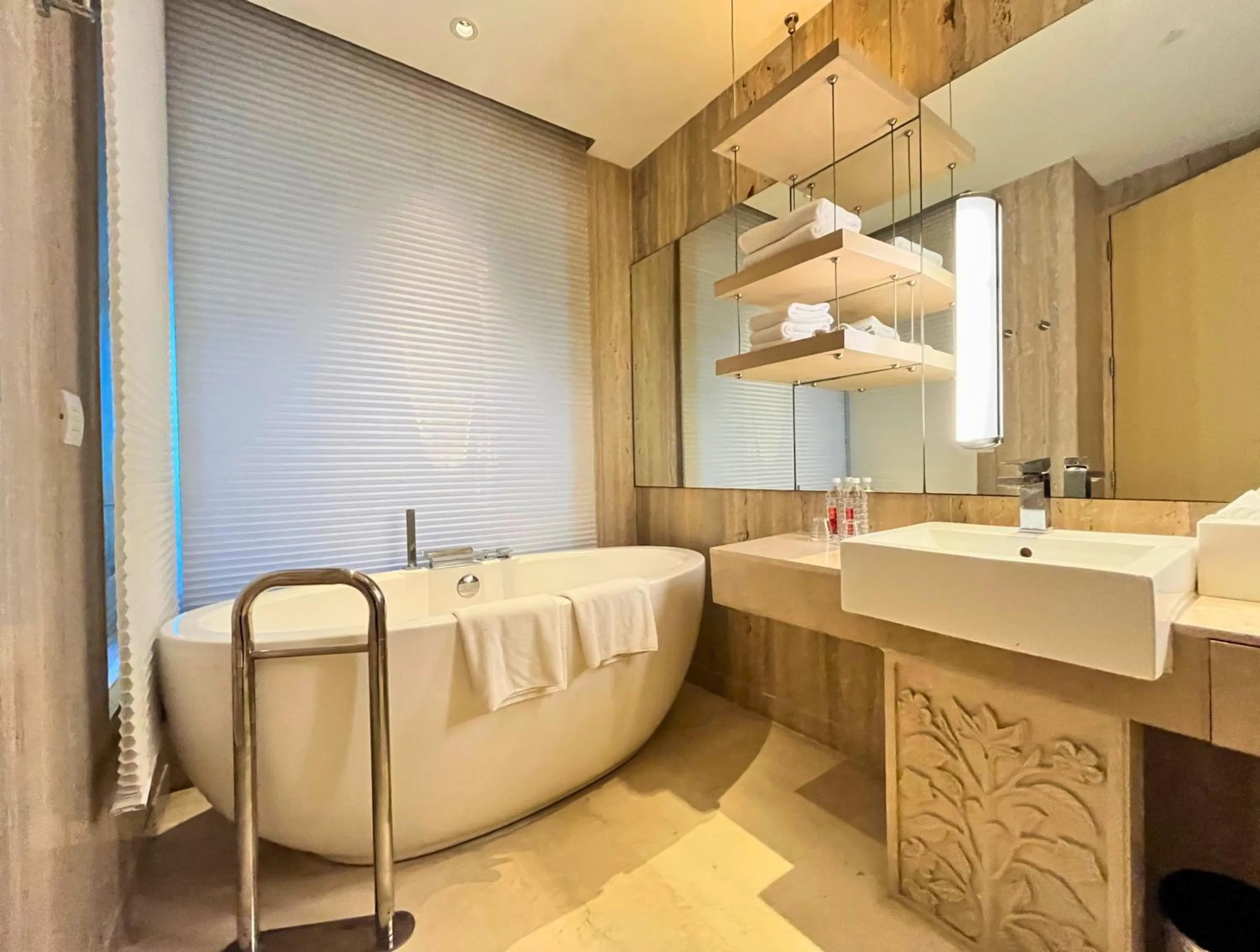 Bathroom in Crowne Plaza Greater Noida by IHG