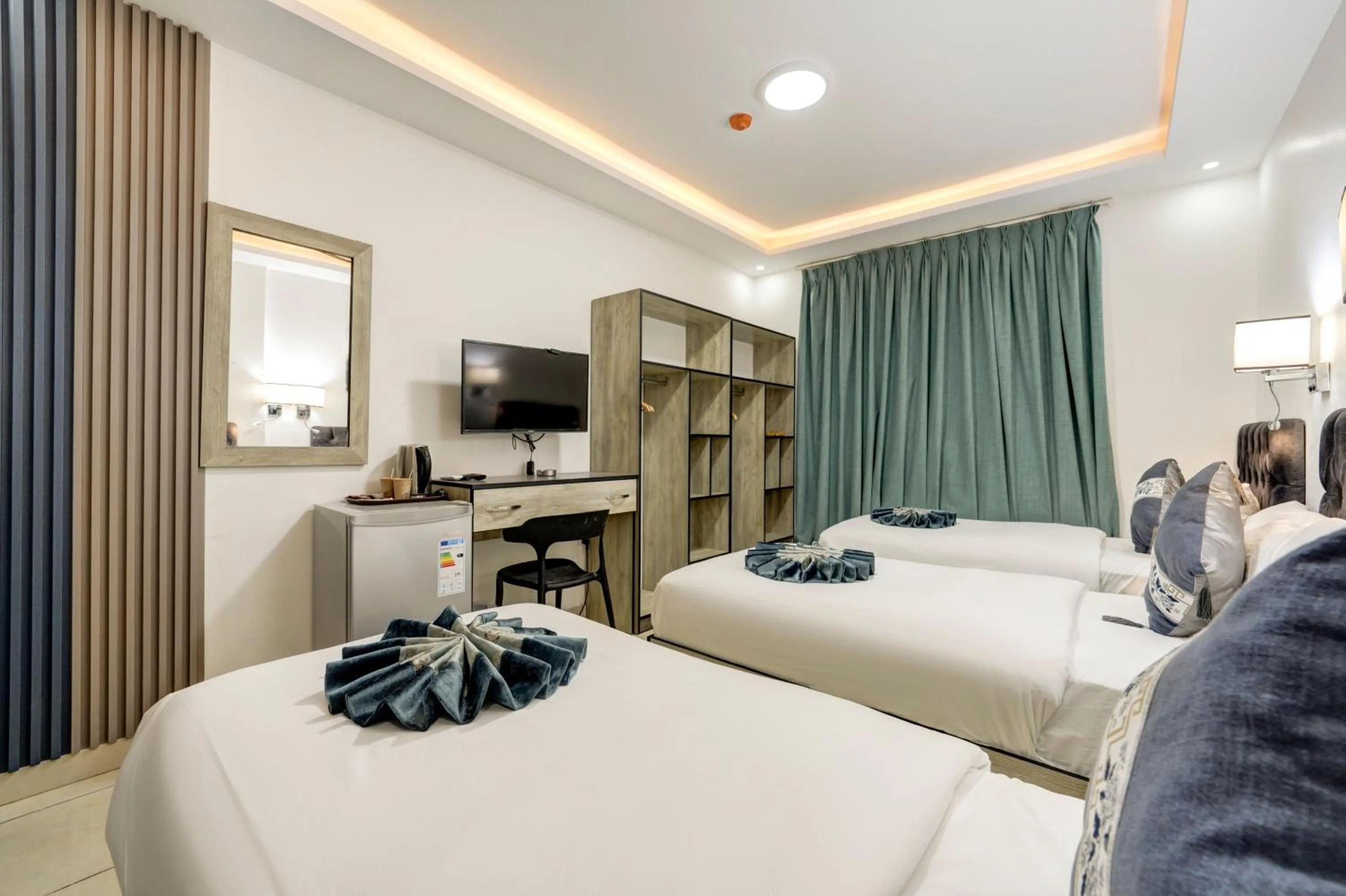 Photo of the whole room in Down Town Hotel