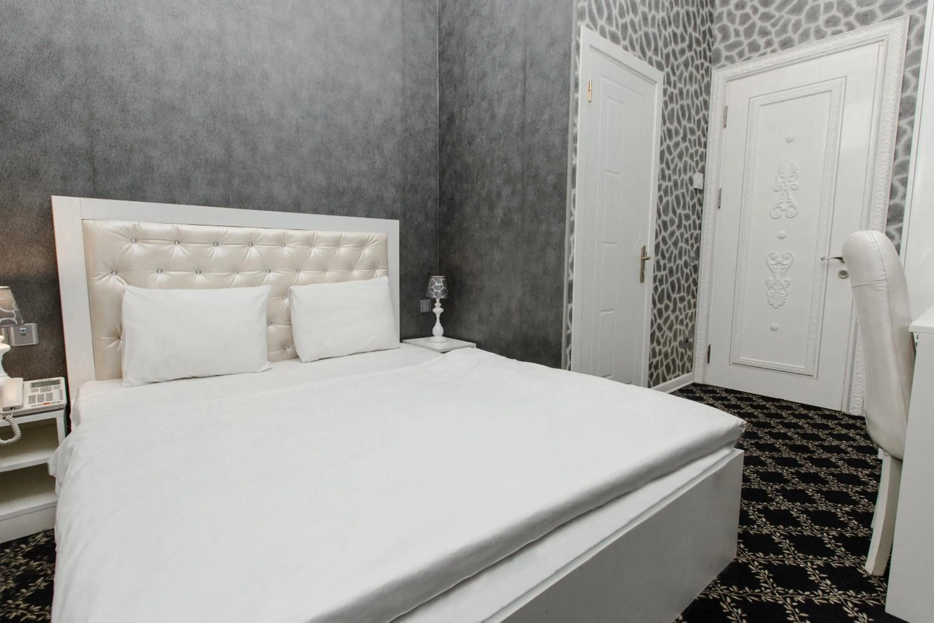 Bed in Admiral Hotel