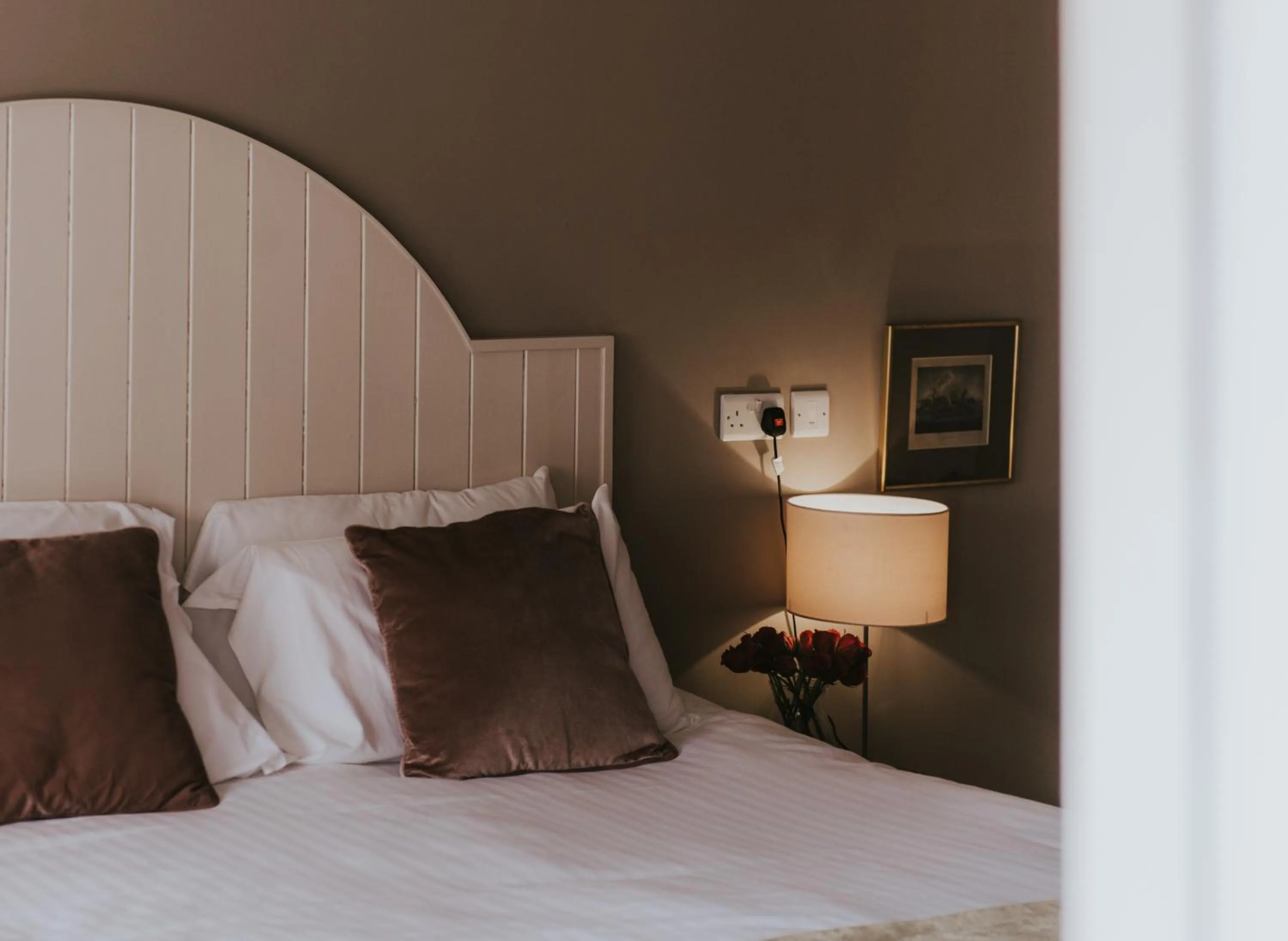 Decorative detail, Bed in Healing Manor Hotel