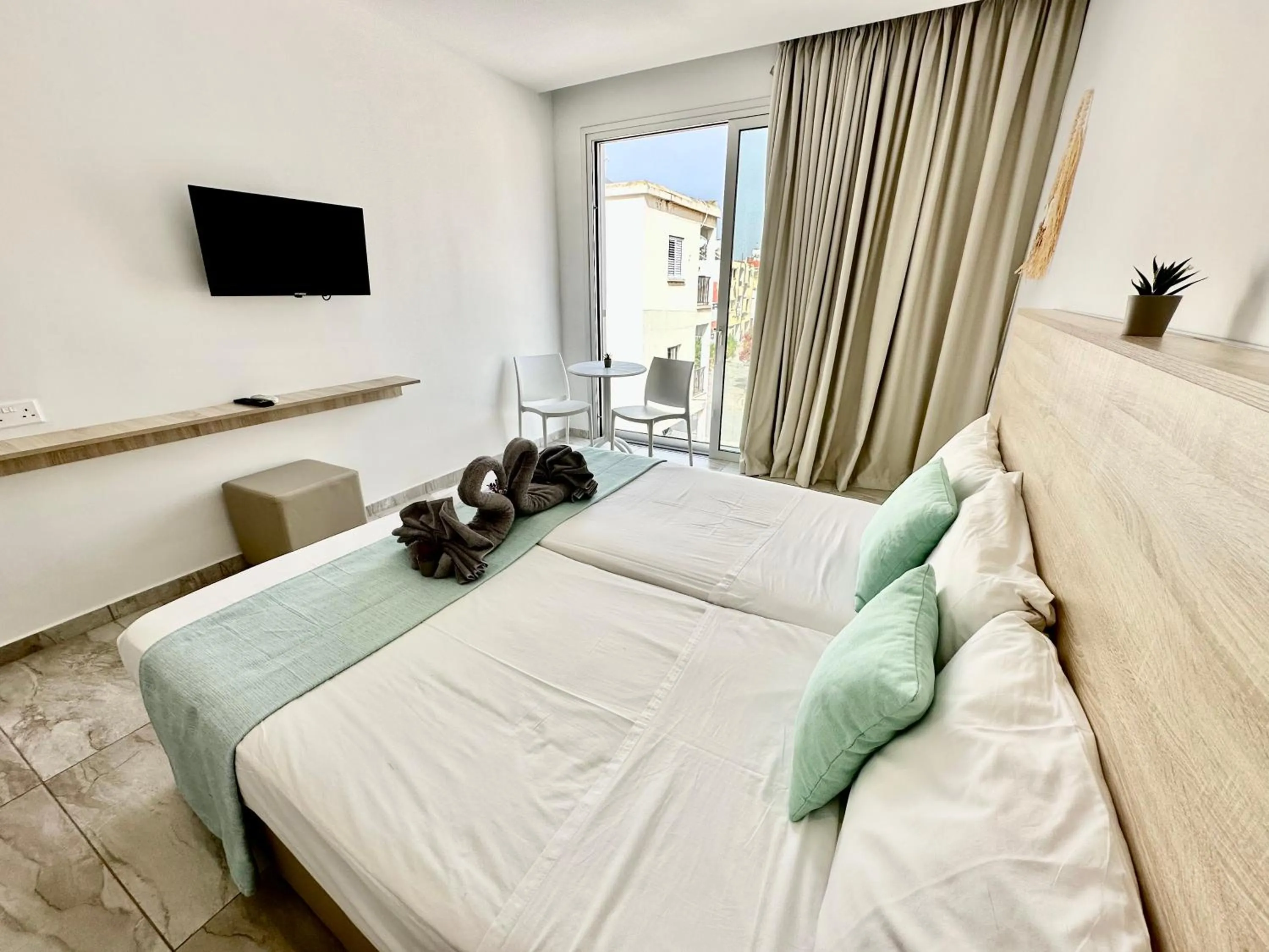 Bedroom, Bed in Sun Plaza Suites - Adults Only