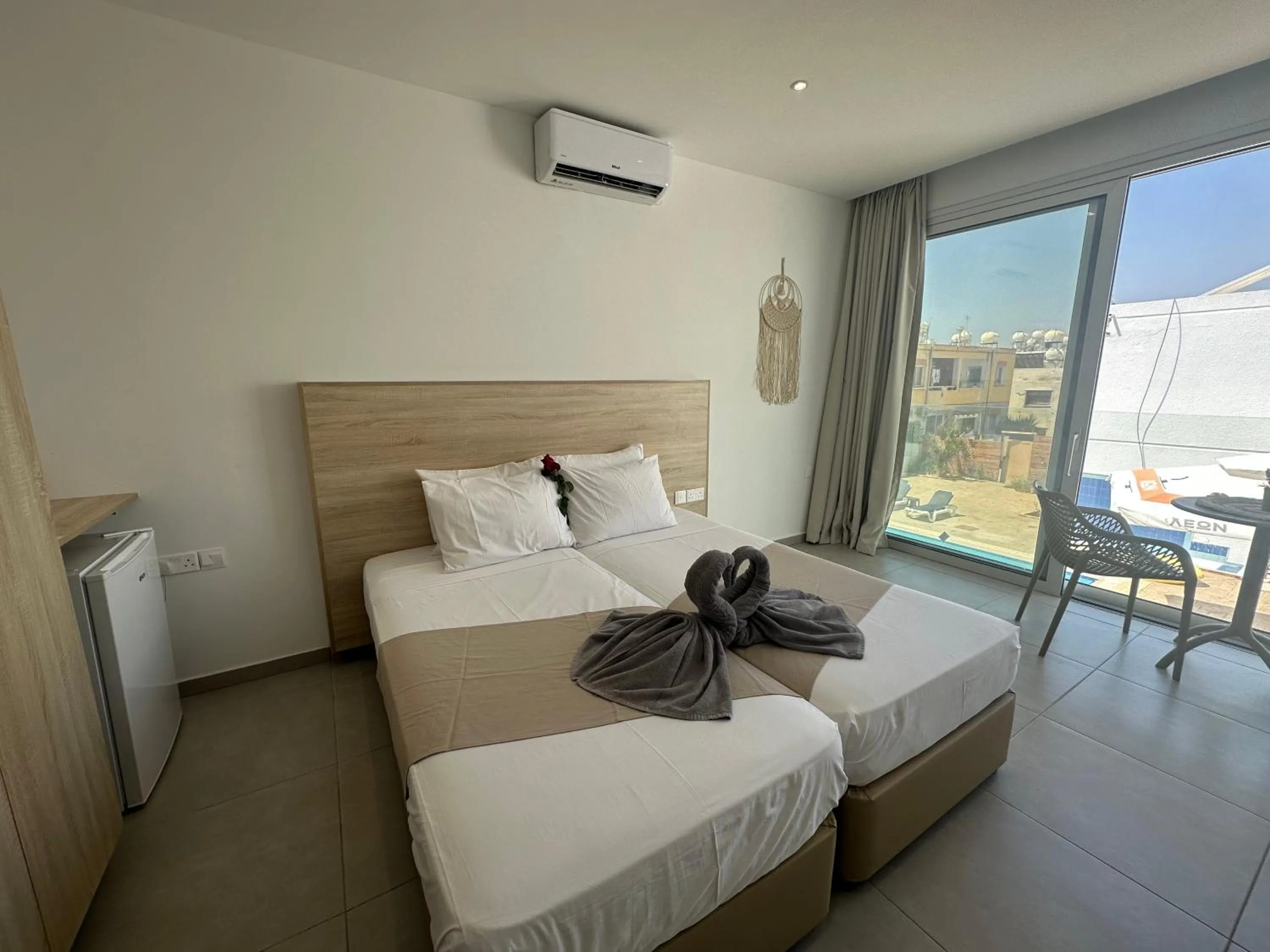 Bed in Sun Plaza Suites - Adults Only