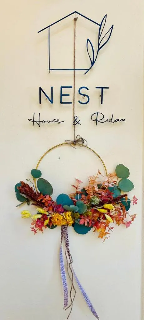 Logo/Certificate/Sign in Nest House & Relax