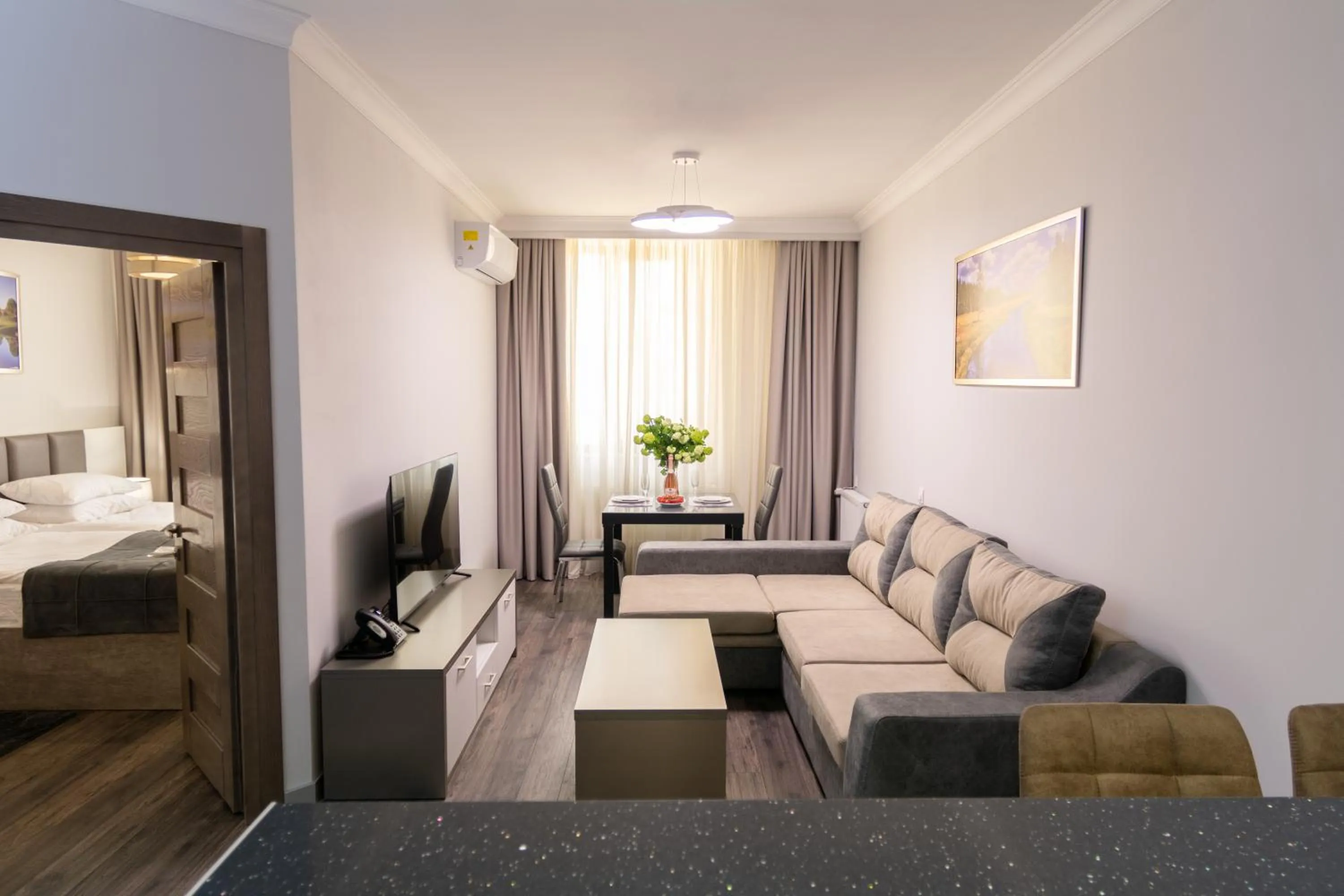 Living room, Bed in Downtown Suites Yerevan