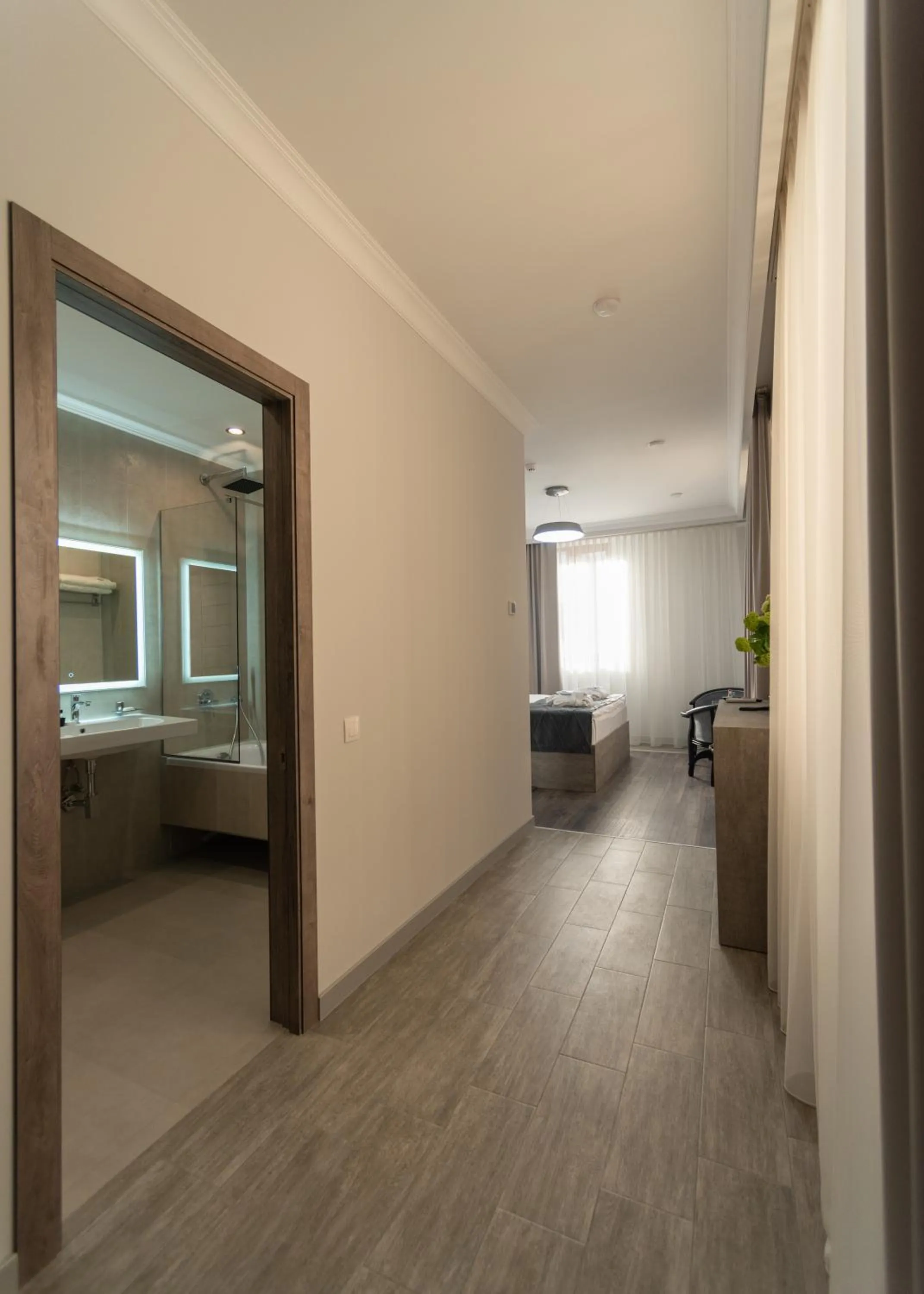 Living room, Bed in Downtown Suites Yerevan