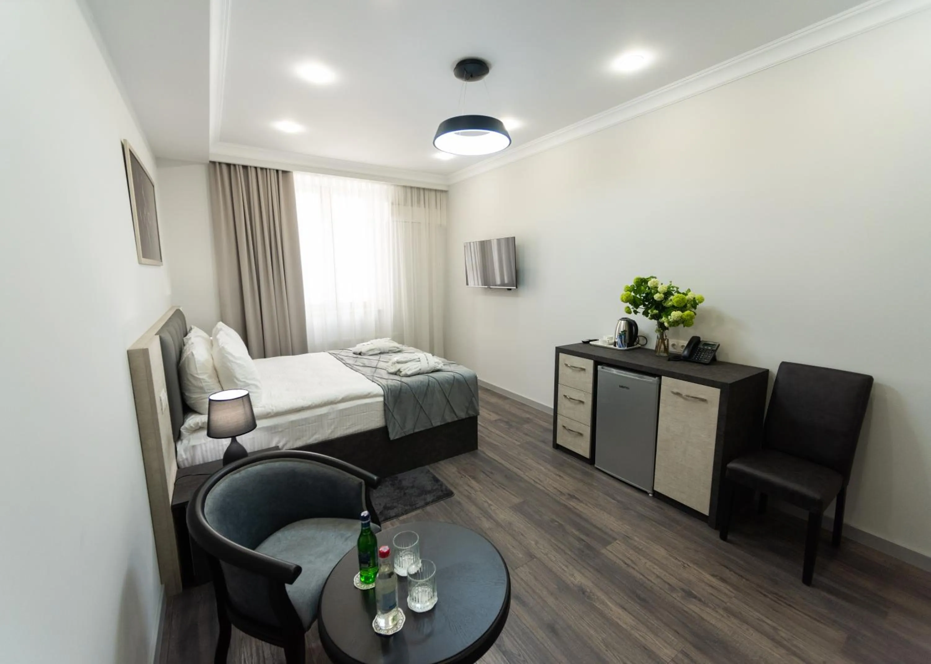 Photo of the whole room, Bed in Downtown Suites Yerevan