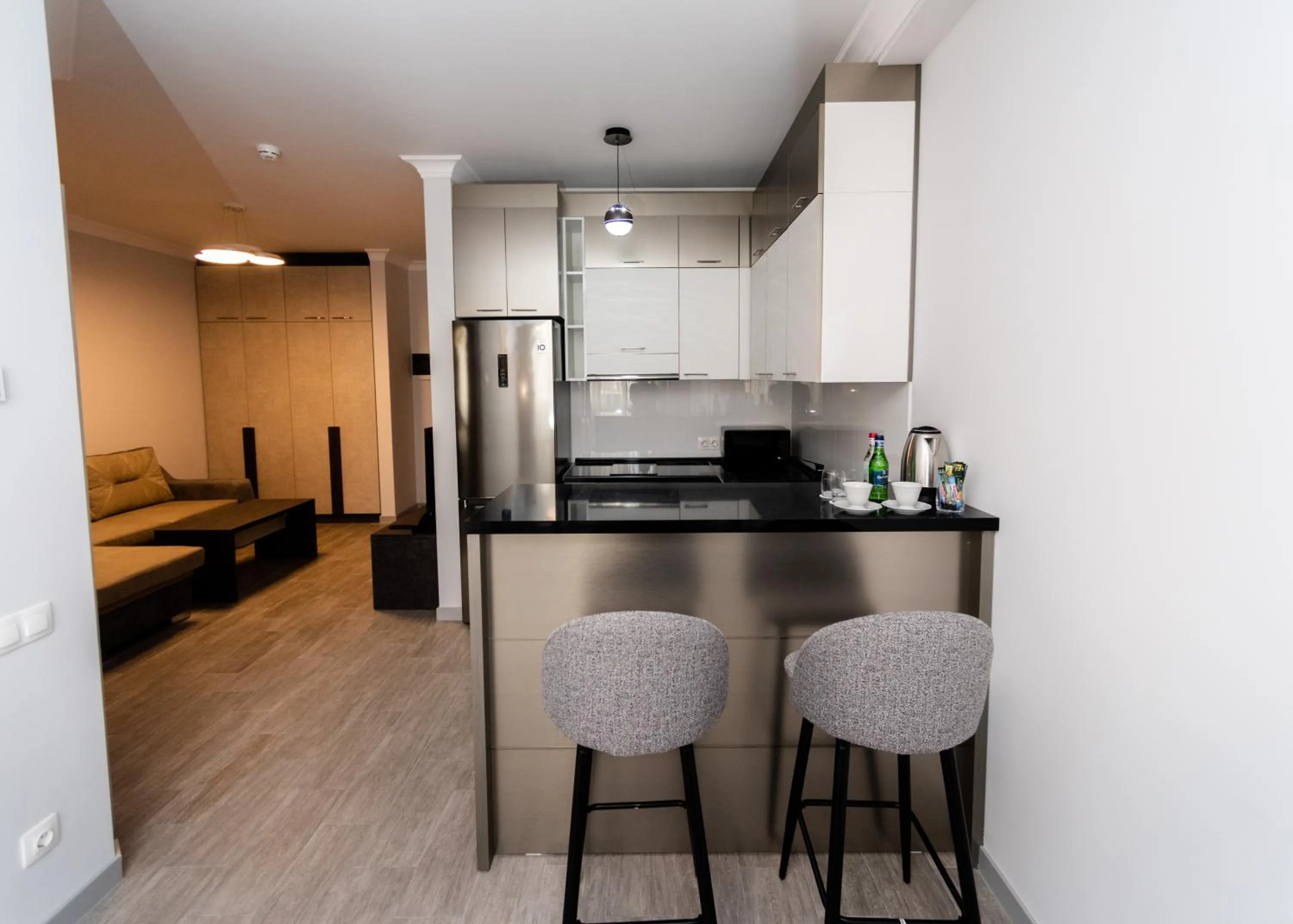 Kitchen or kitchenette, Bed in Downtown Suites Yerevan