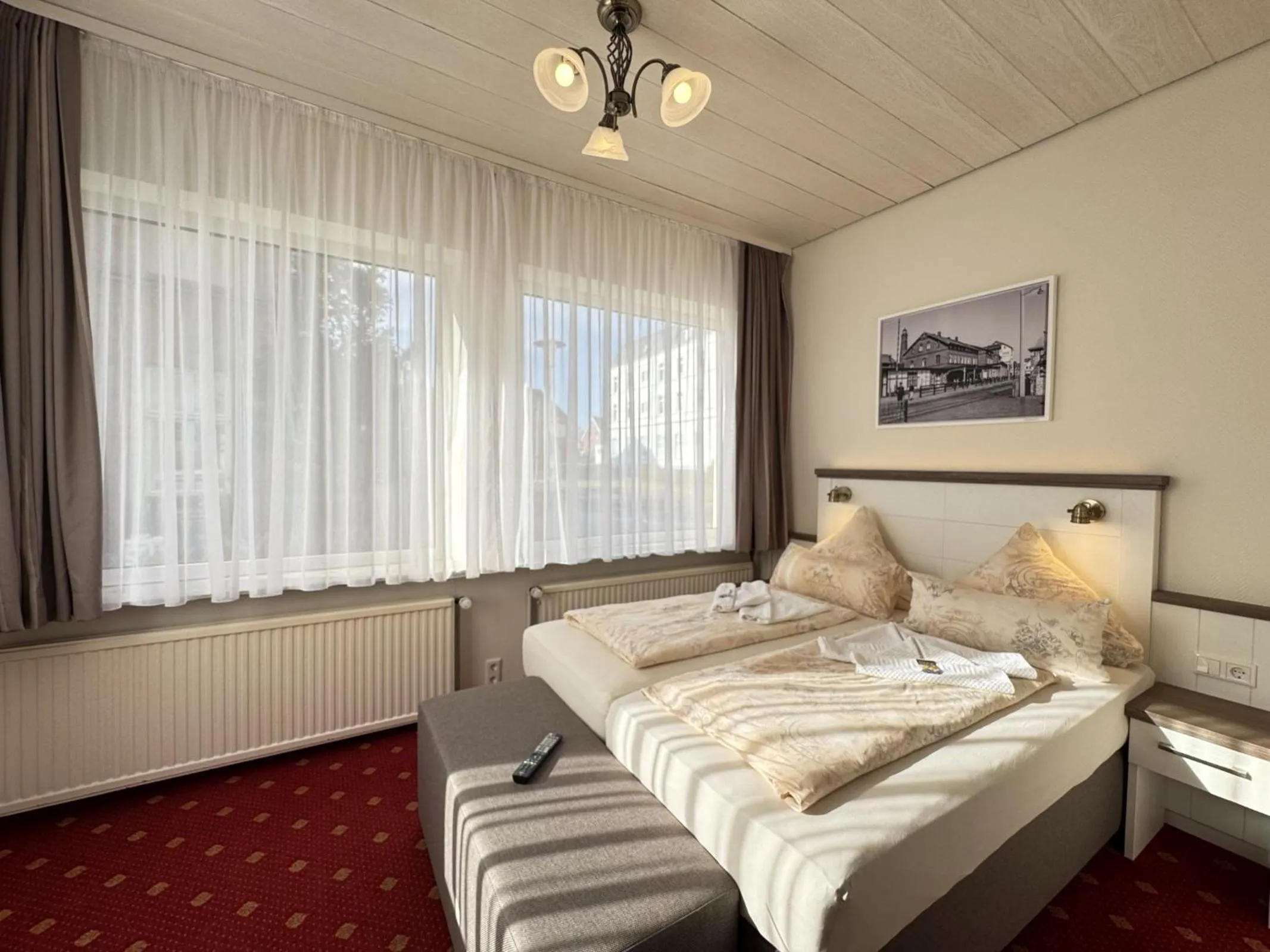 Photo of the whole room, Bed in Hotel Weisse Düne