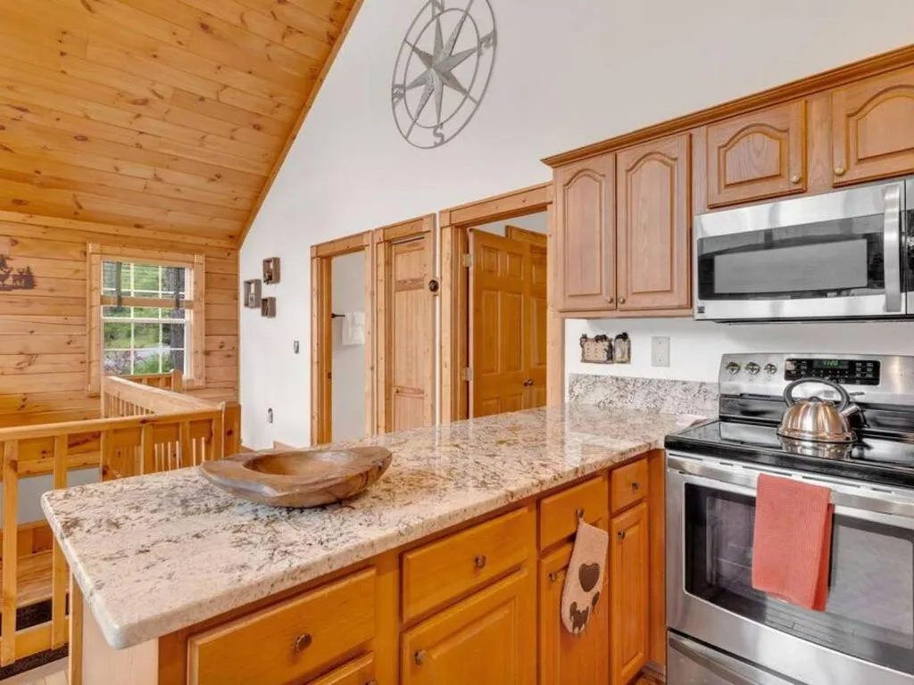 Kitchen or kitchenette in Soco Serene Cabin in the Heart of Maggie Valley