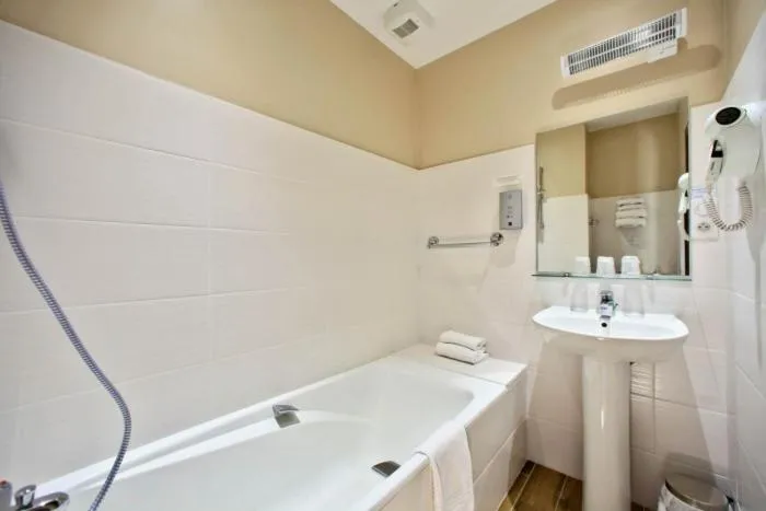 Bathroom in Logis Hôtel La Chaumière