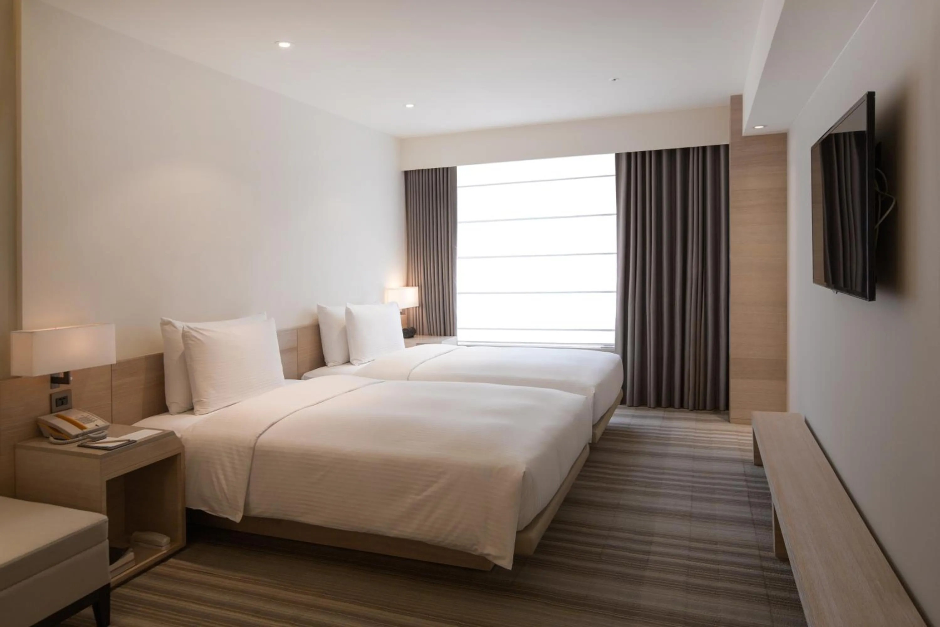 Bed in Hotel COZZI Zhongxiao Taipei