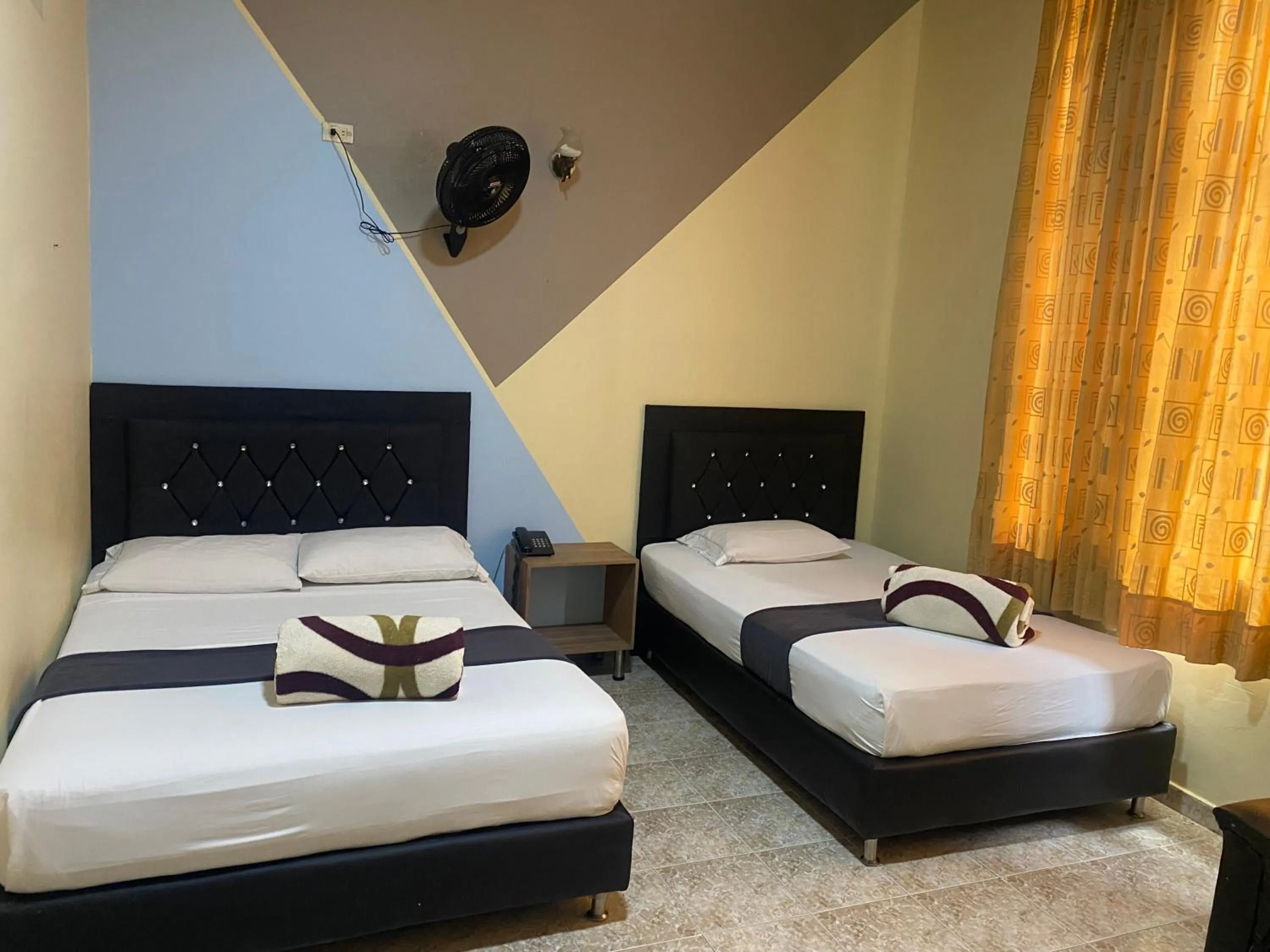 Bed in HOTEL CALLE REAL SUITE