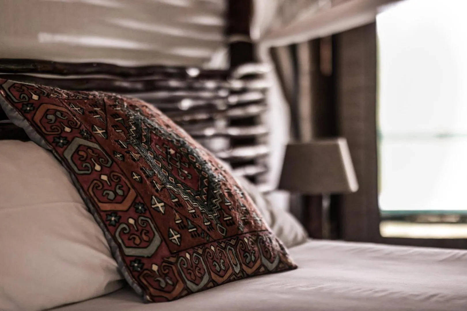 Bed in Muweti Bush Lodge