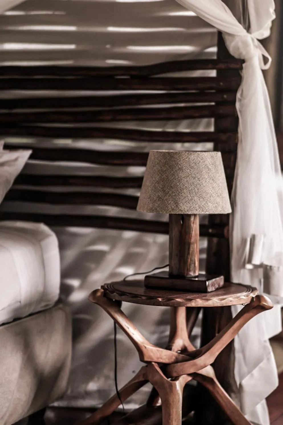 Bed in Muweti Bush Lodge