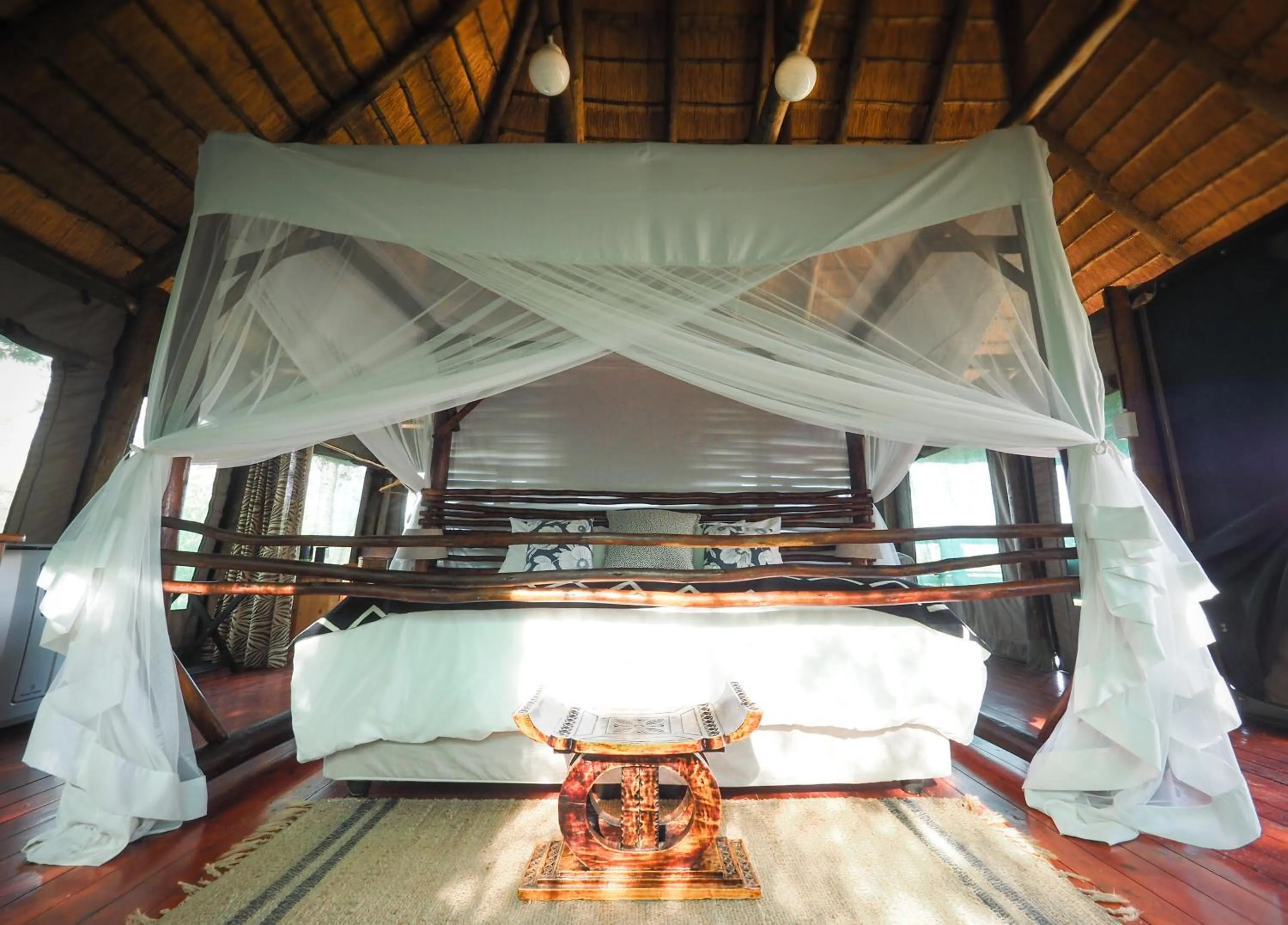 Bed in Muweti Bush Lodge