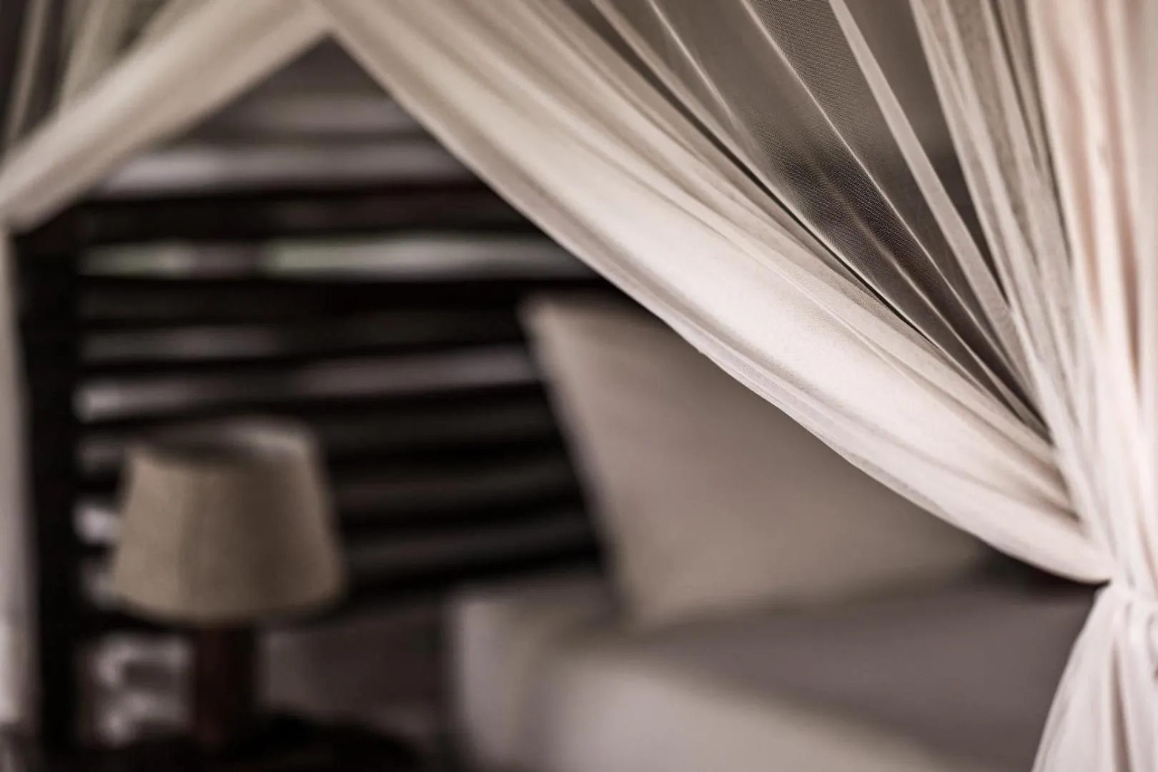 Bed in Muweti Bush Lodge