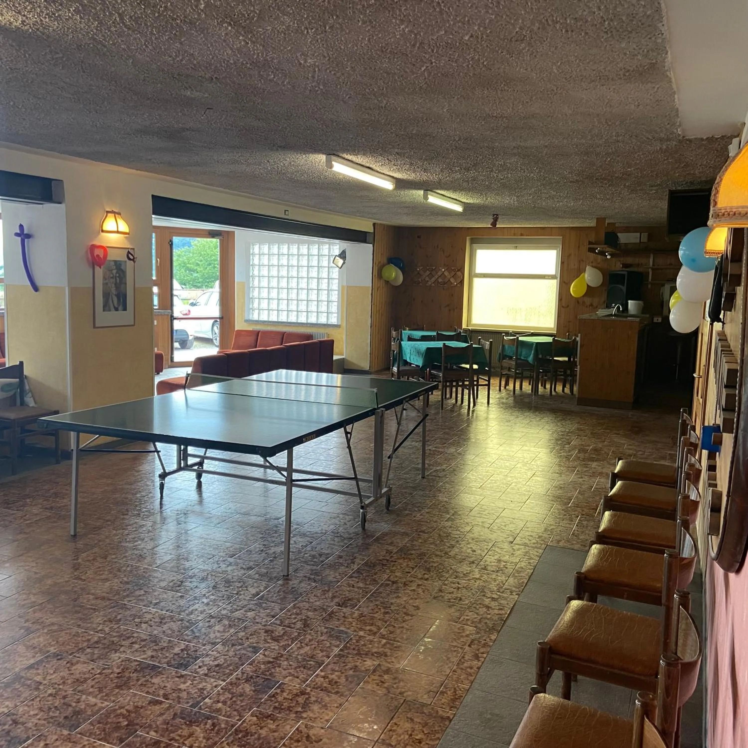 Communal lounge/ TV room in Hotel Olisamir