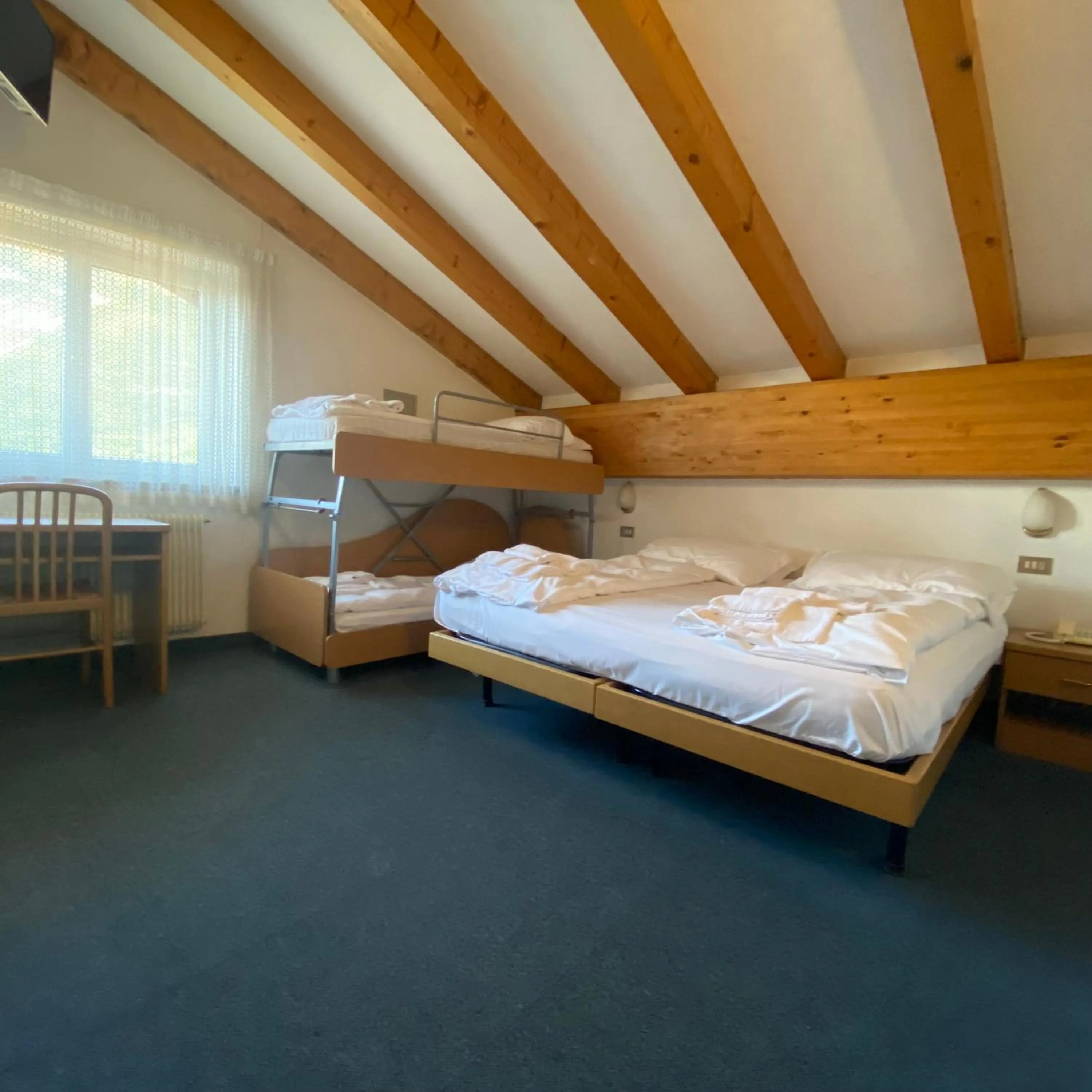 Bed in Hotel Olisamir