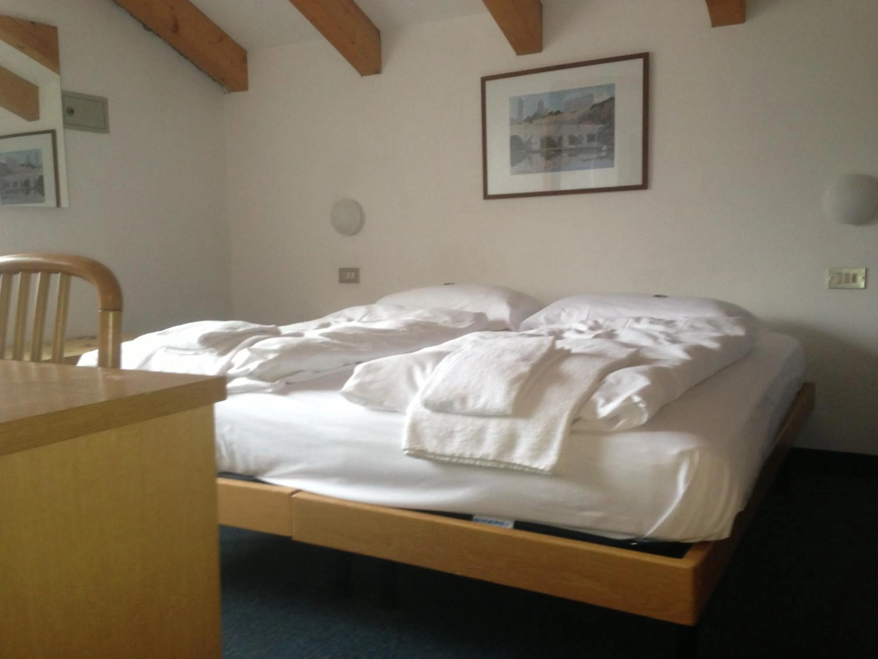 Bed in Hotel Olisamir