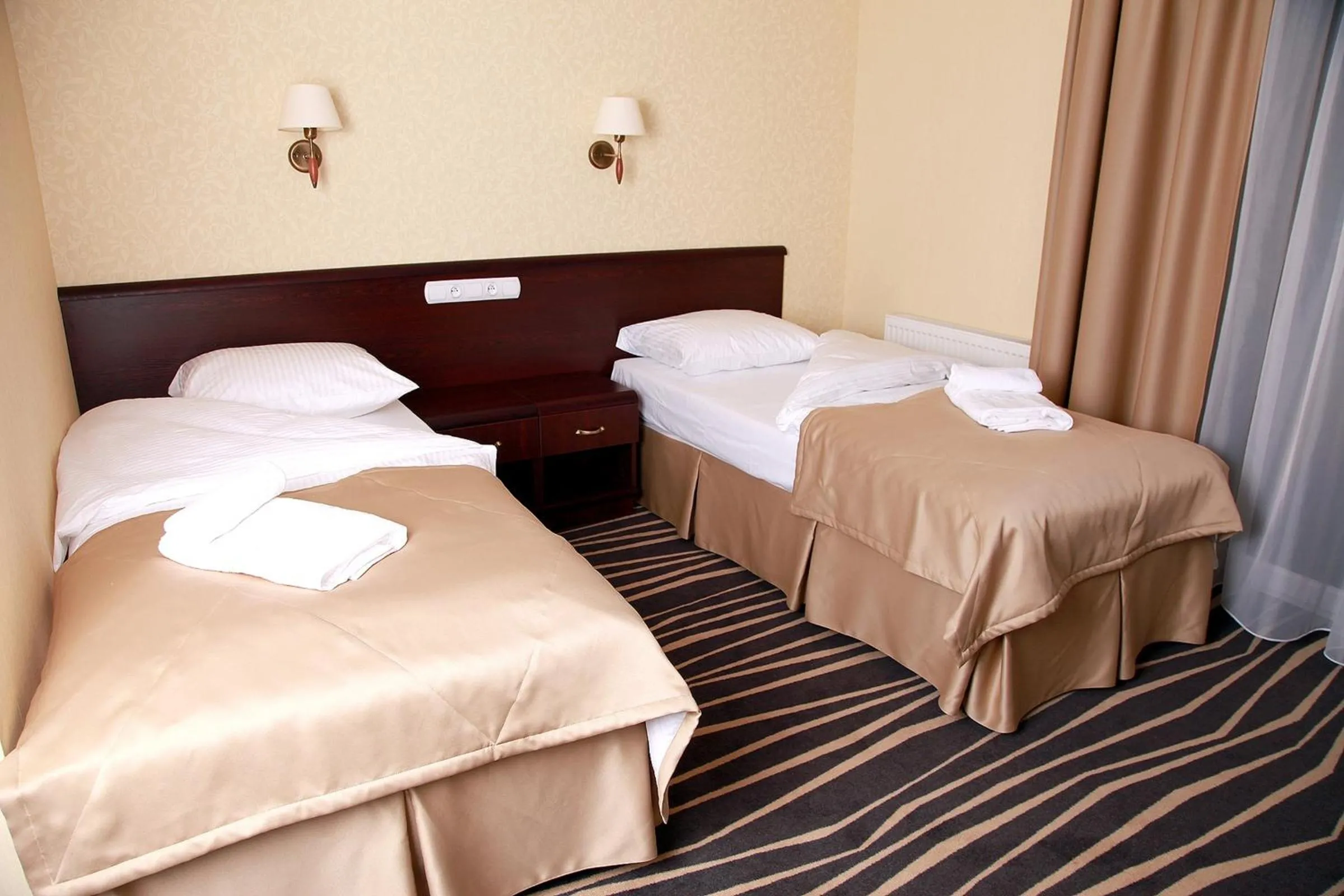 Bed in Hotel Adria