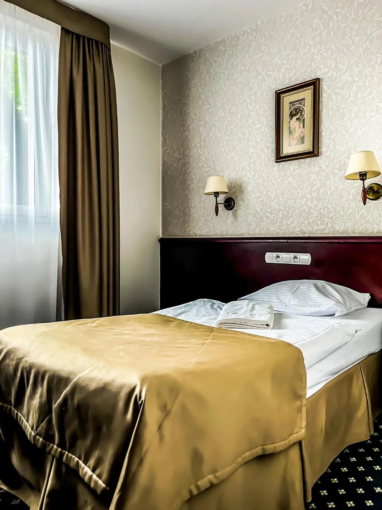 Bed in Hotel Adria