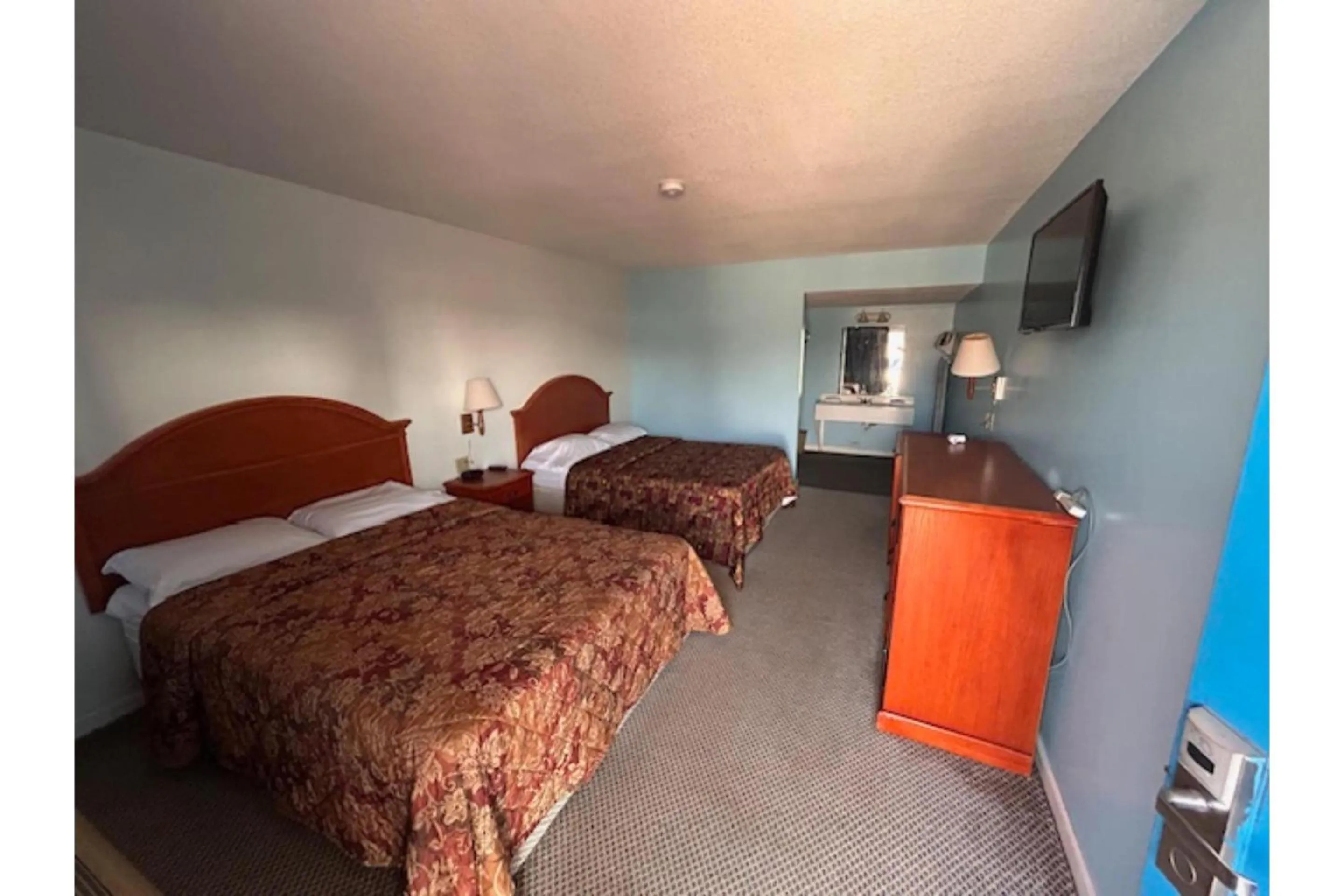 Bedroom in Sky Palace Inn By OYO Anthony KS