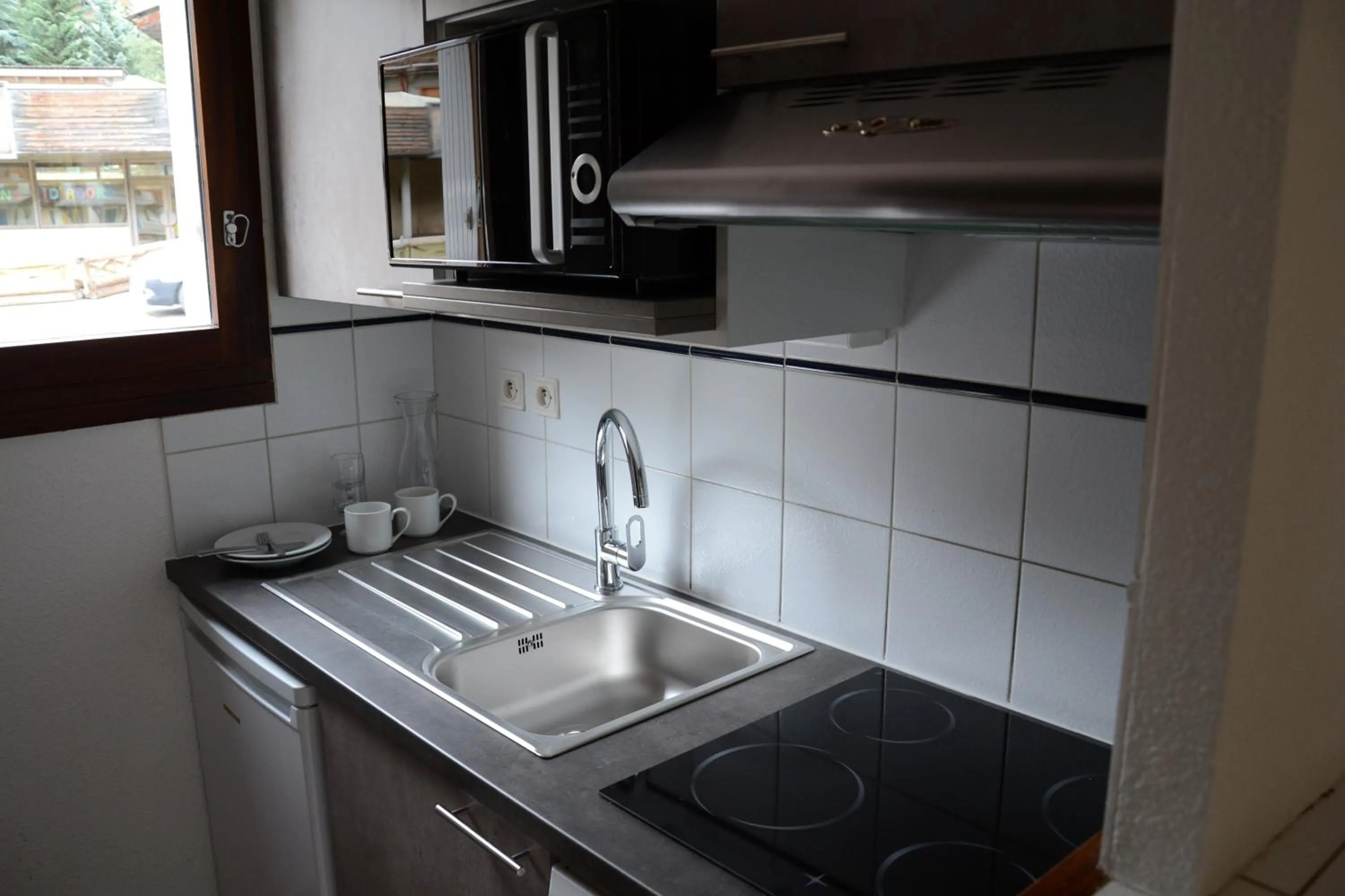 Kitchen or kitchenette in Chalets Jardin Alpin by Mountain Collection Immobilier