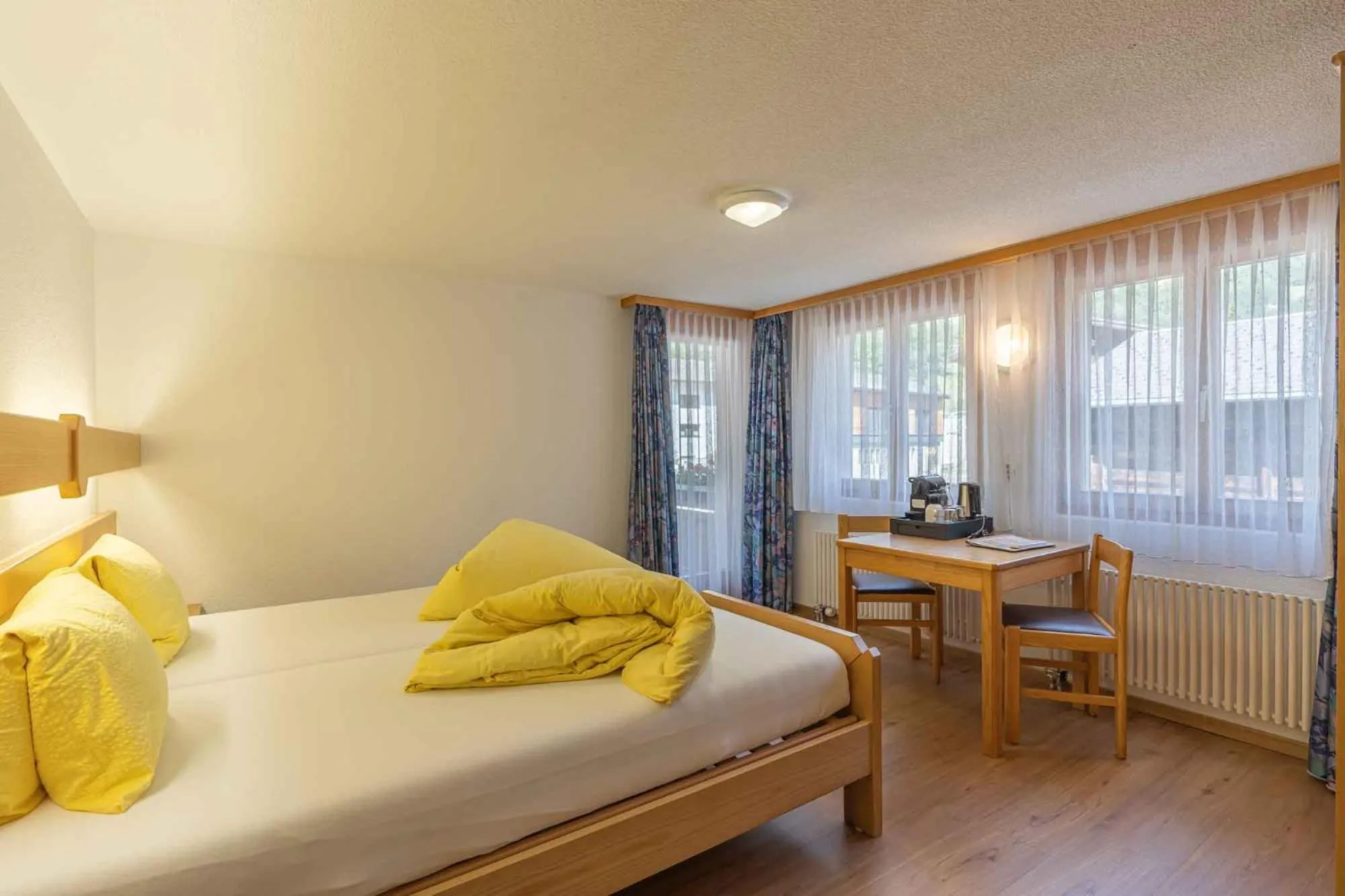 Photo of the whole room, Bed in Aktiv- und Genusshotel Alpenblick