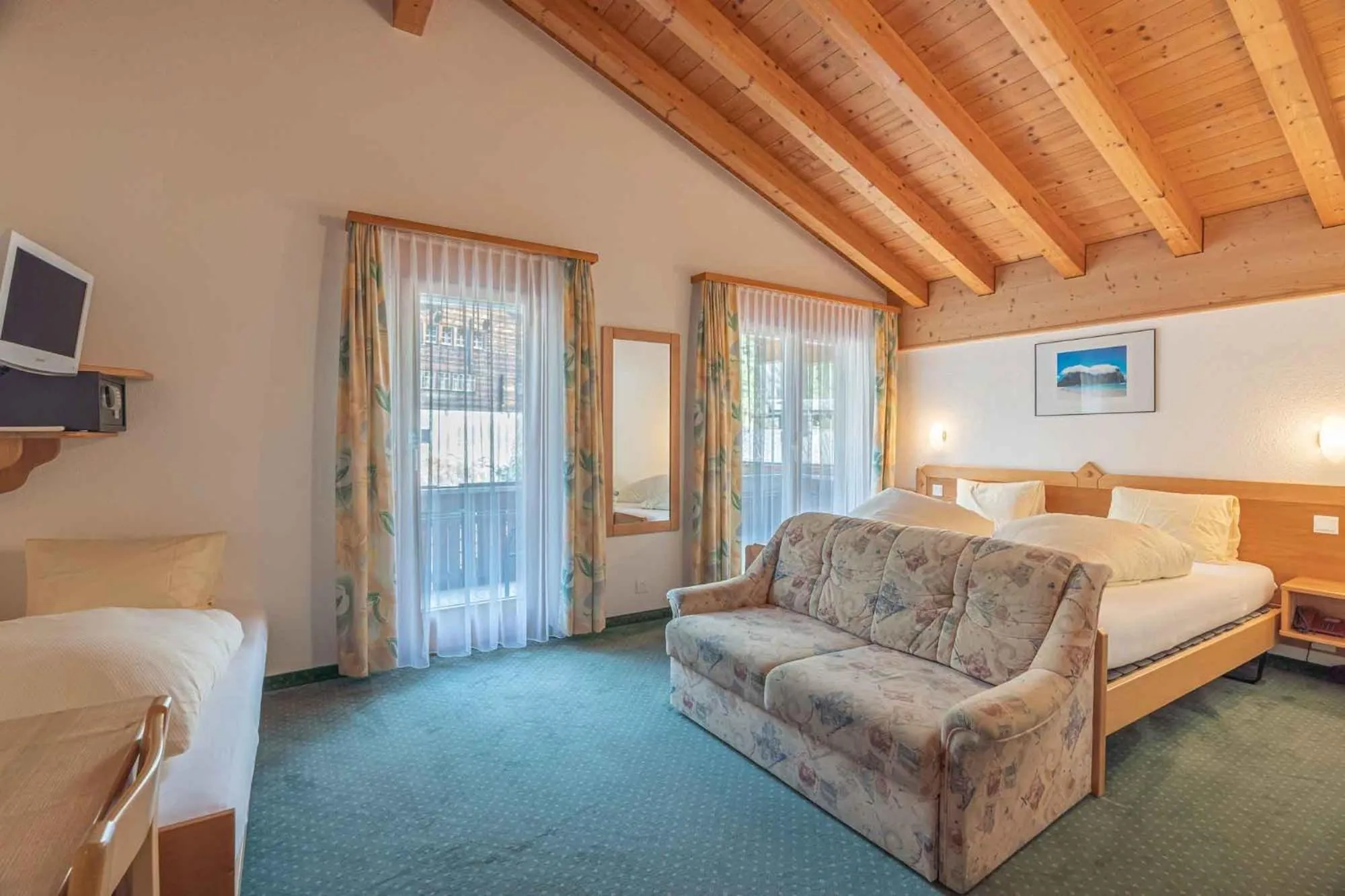 Photo of the whole room, Bed in Aktiv- und Genusshotel Alpenblick