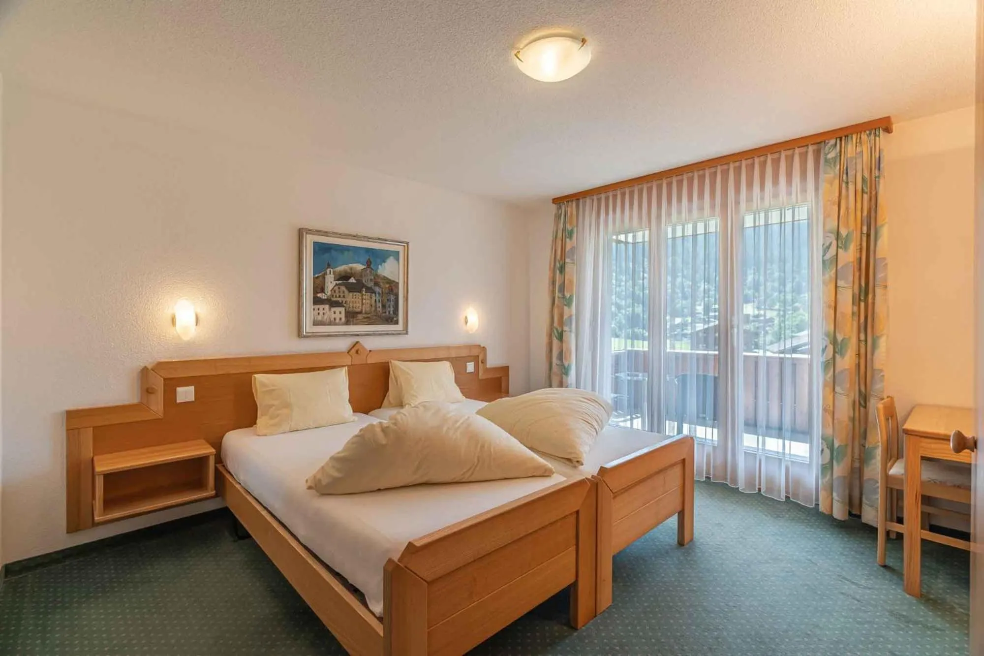 Photo of the whole room, Bed in Aktiv- und Genusshotel Alpenblick