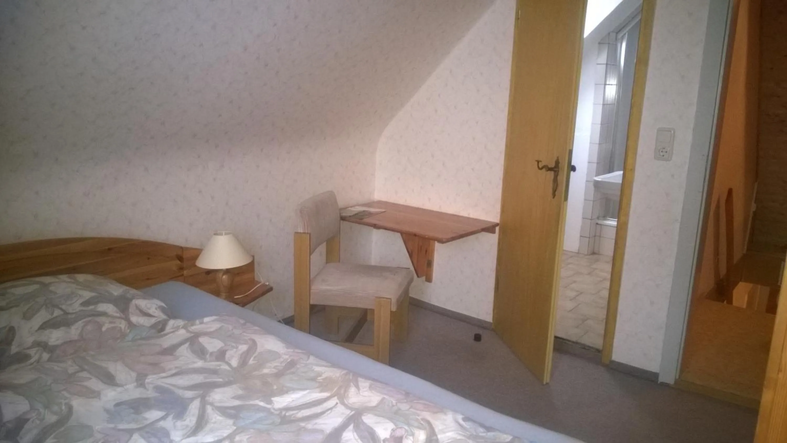 Photo of the whole room, Bed in Wiedaer Hütte