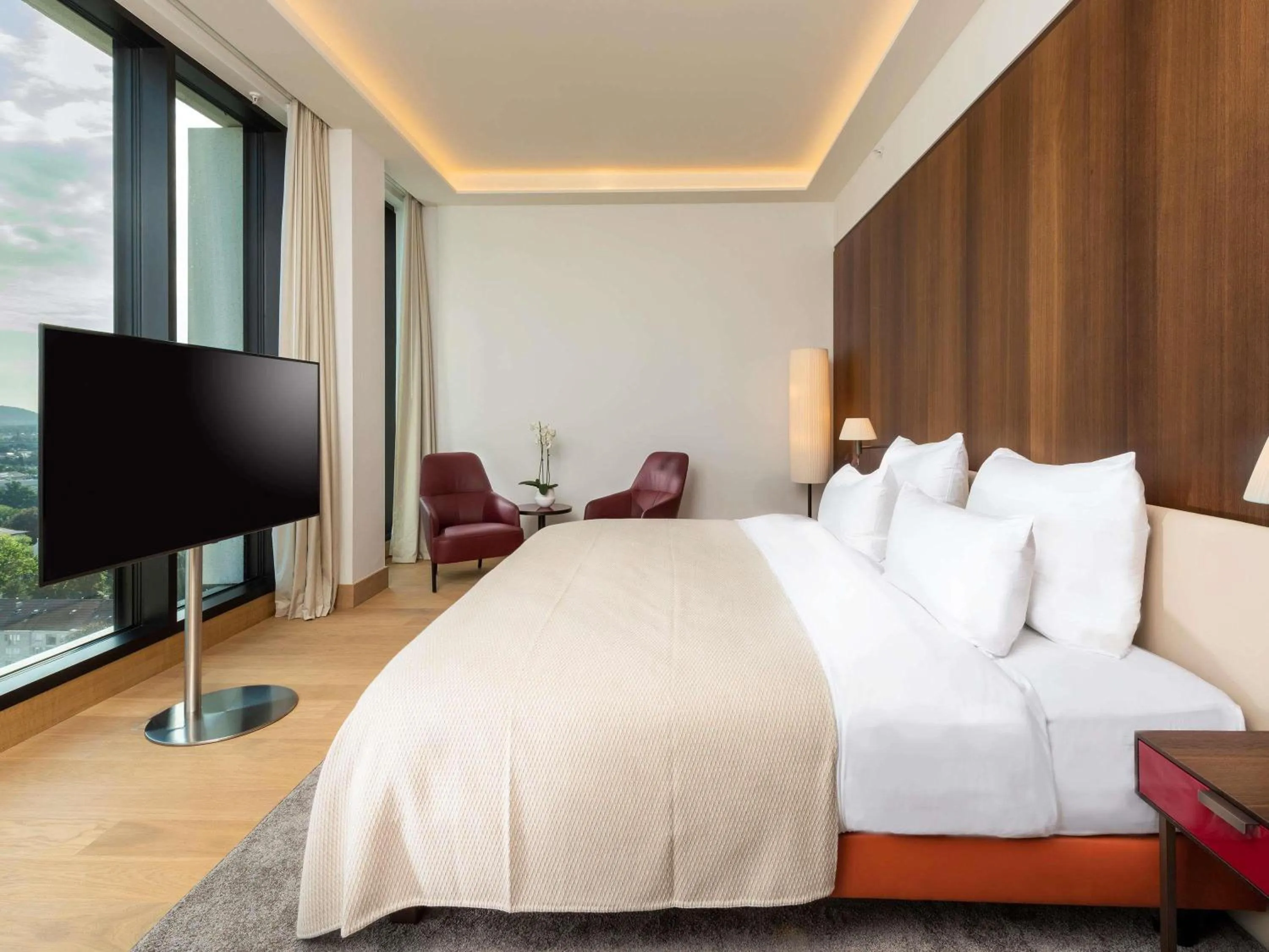 Photo of the whole room, Bed in Mövenpick Hotel Basel