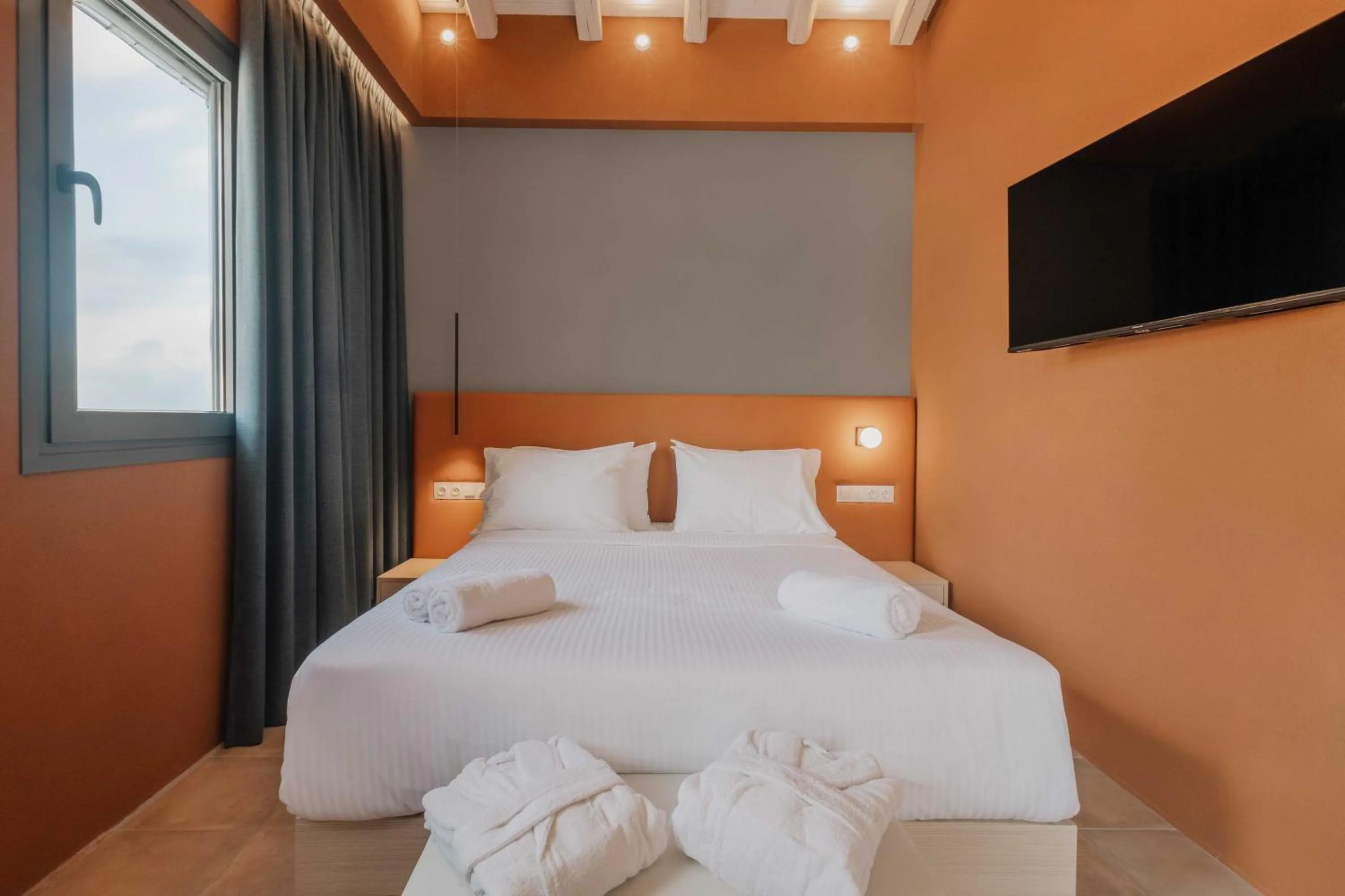 Bed in Tessera Villas & Studios Collection