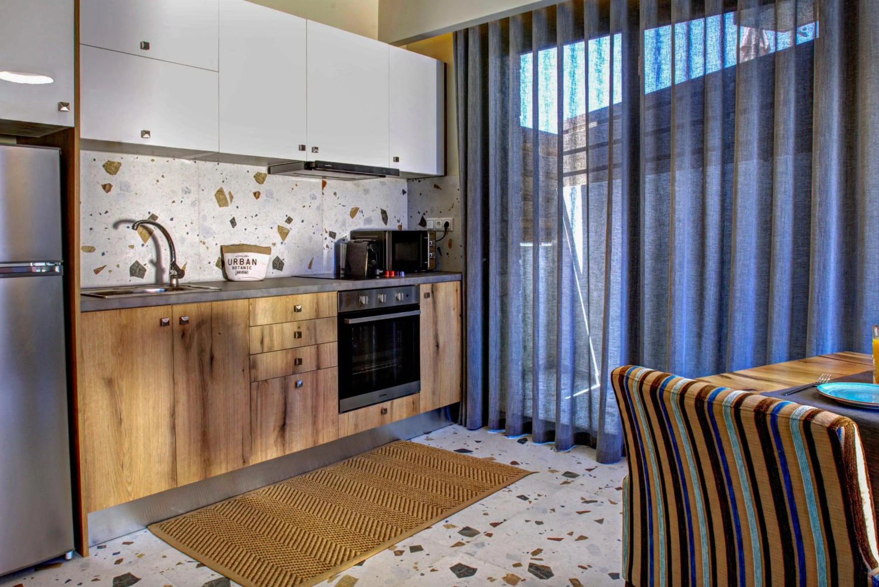 Kitchen or kitchenette in Tessera Villas & Studios Collection