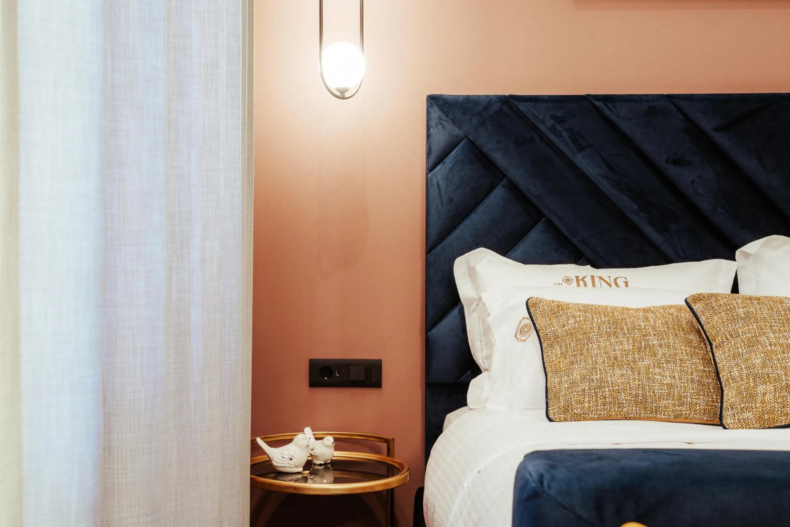 Bed in Espero Royal Stay