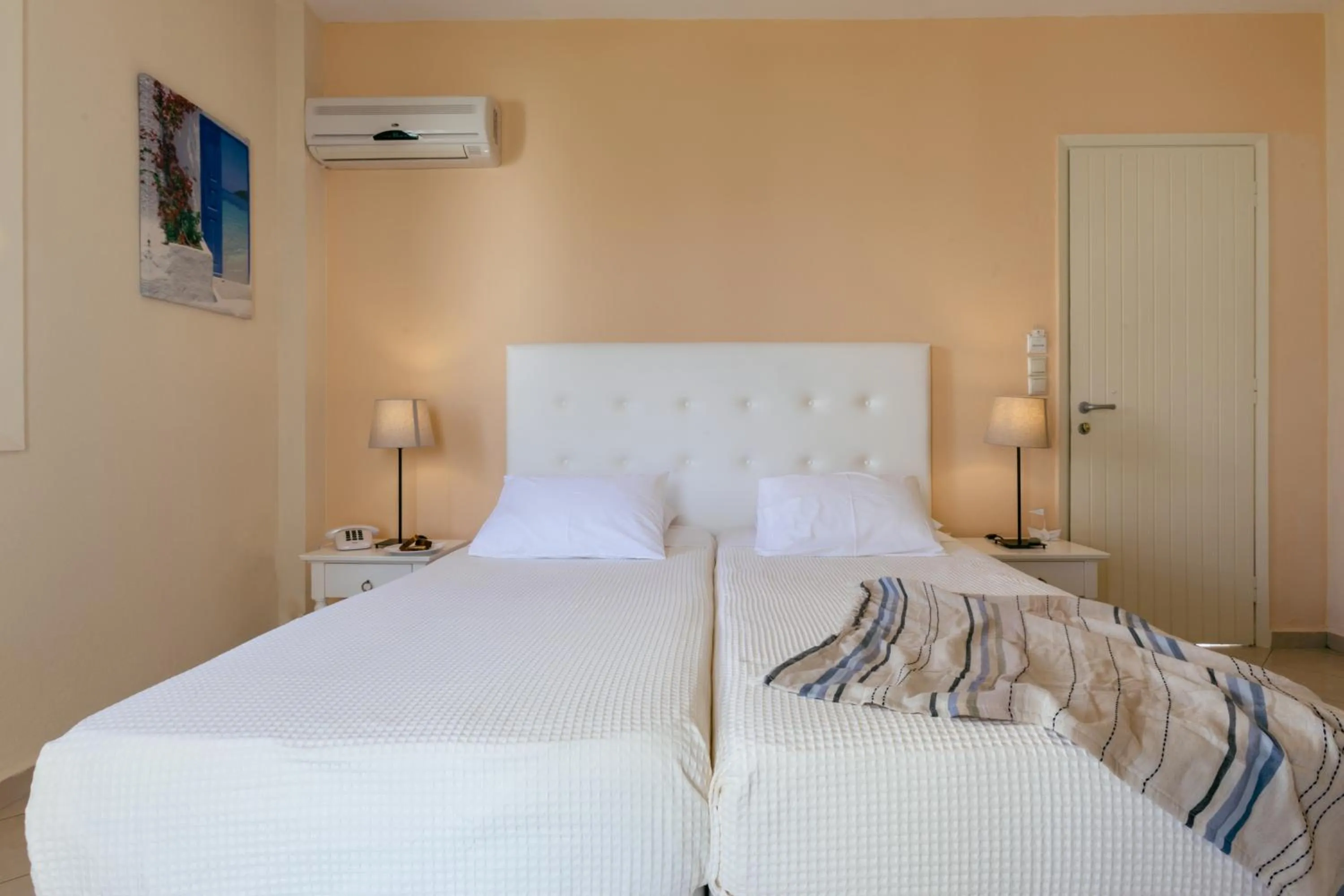 Bed in Mikri Vigla Hotel Beach Resort