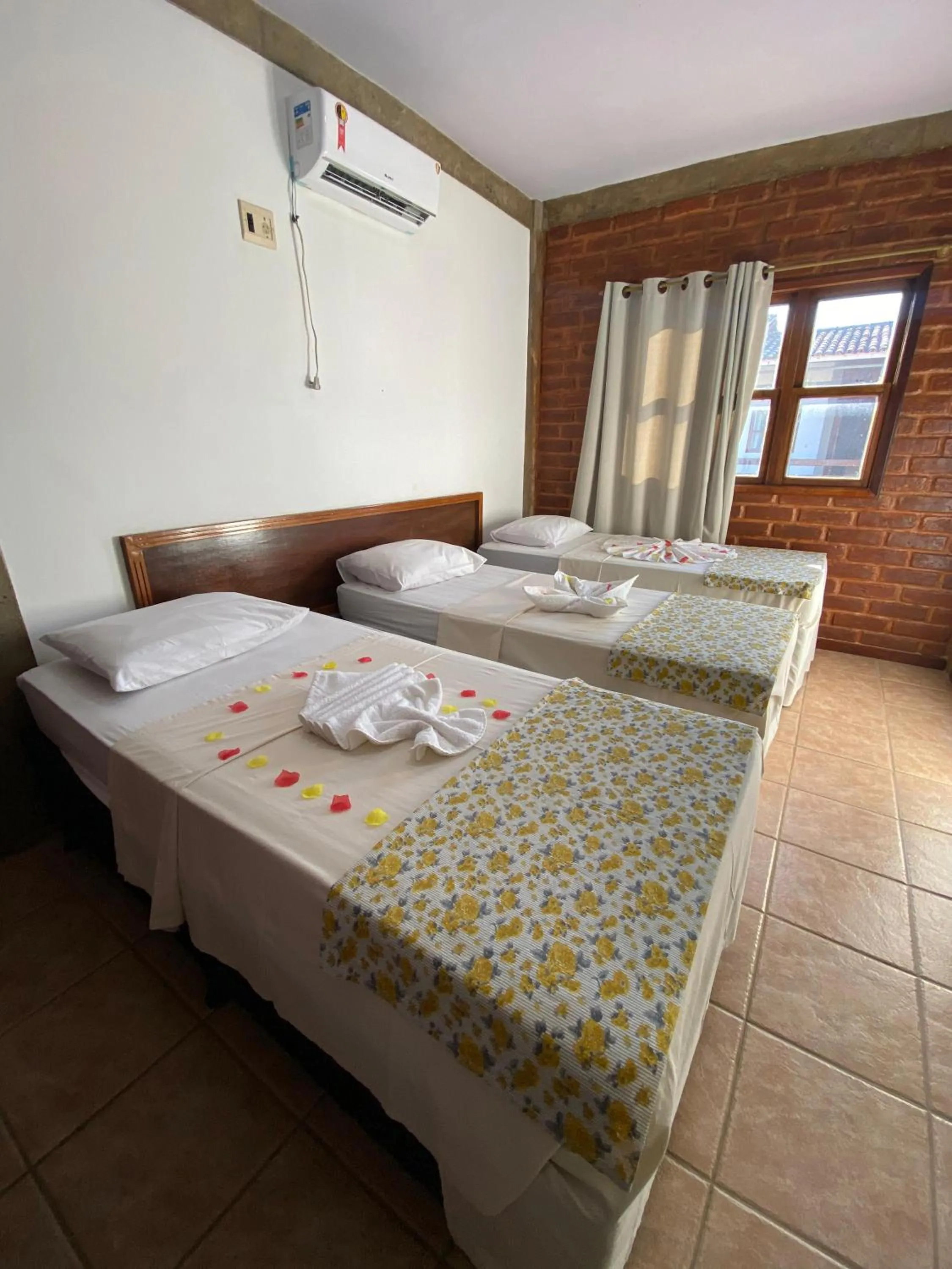 Bed in Pousada e Chale Porto Paraiso