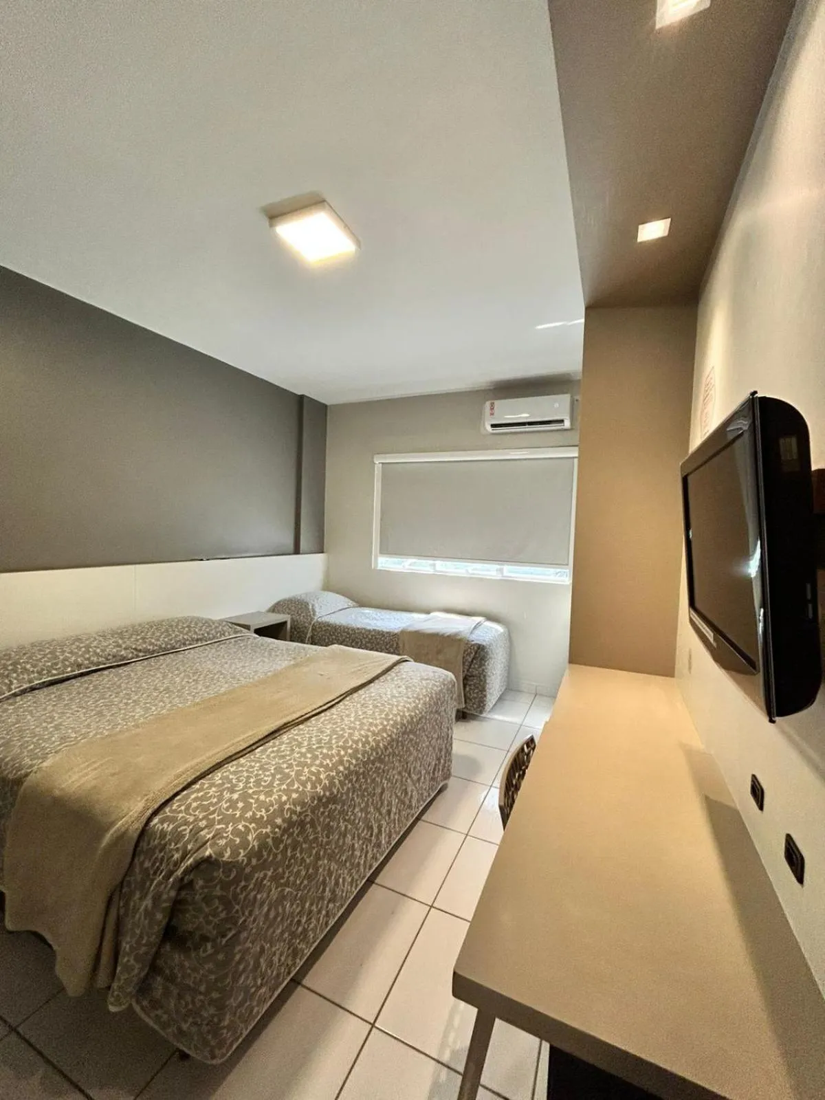 Bed in Hotel Palmas Executivo