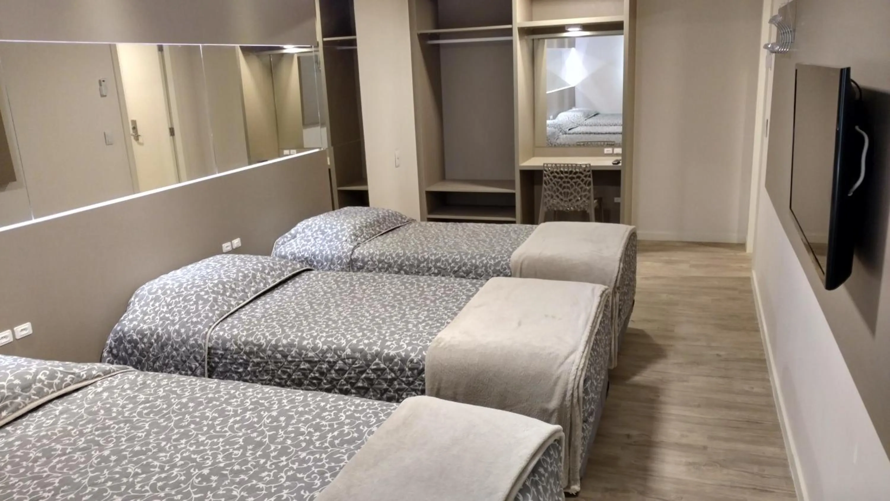 Bed in Hotel Palmas Executivo