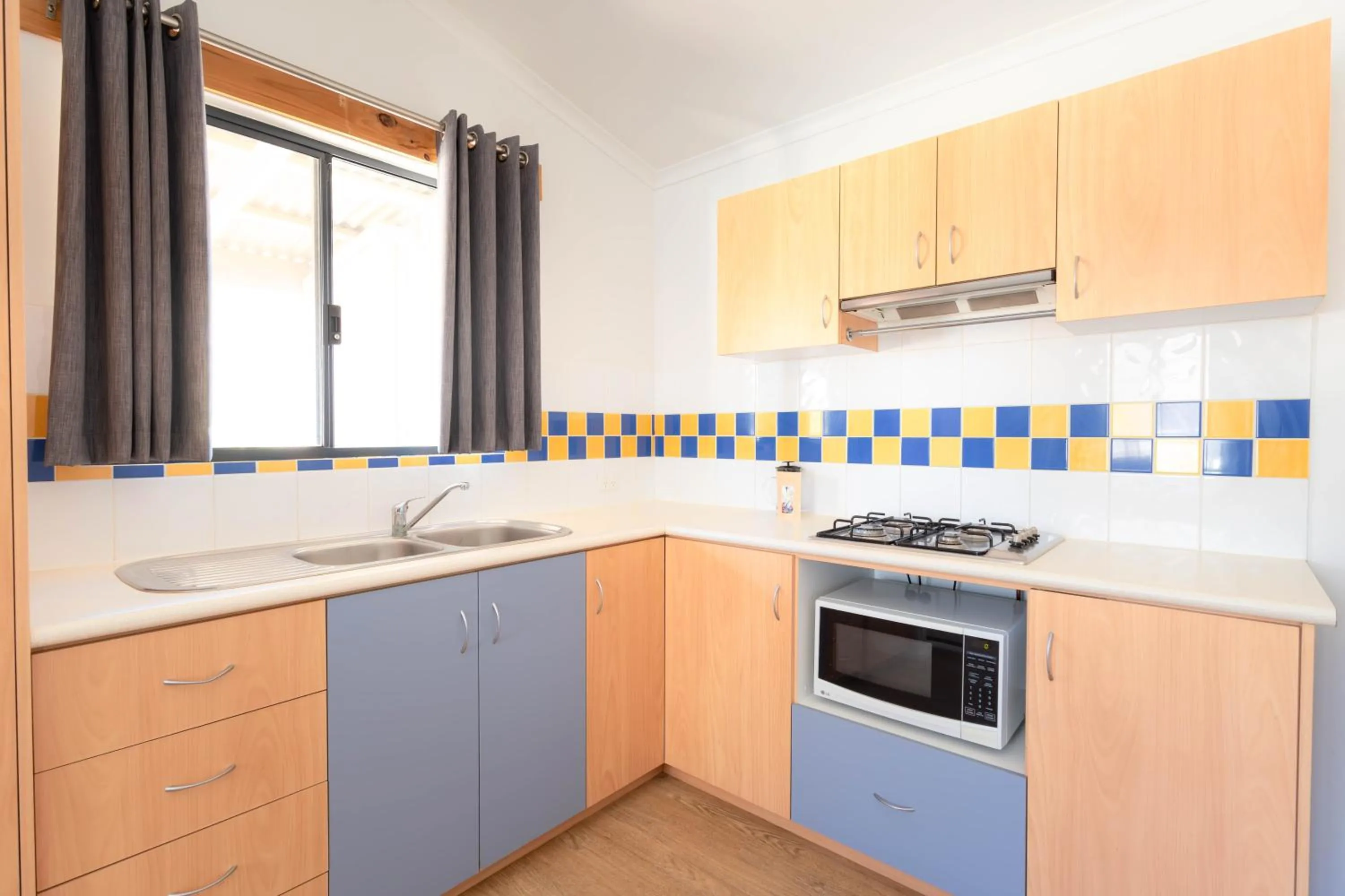 Kitchen or kitchenette in Ningaloo Caravan and Holiday Resort