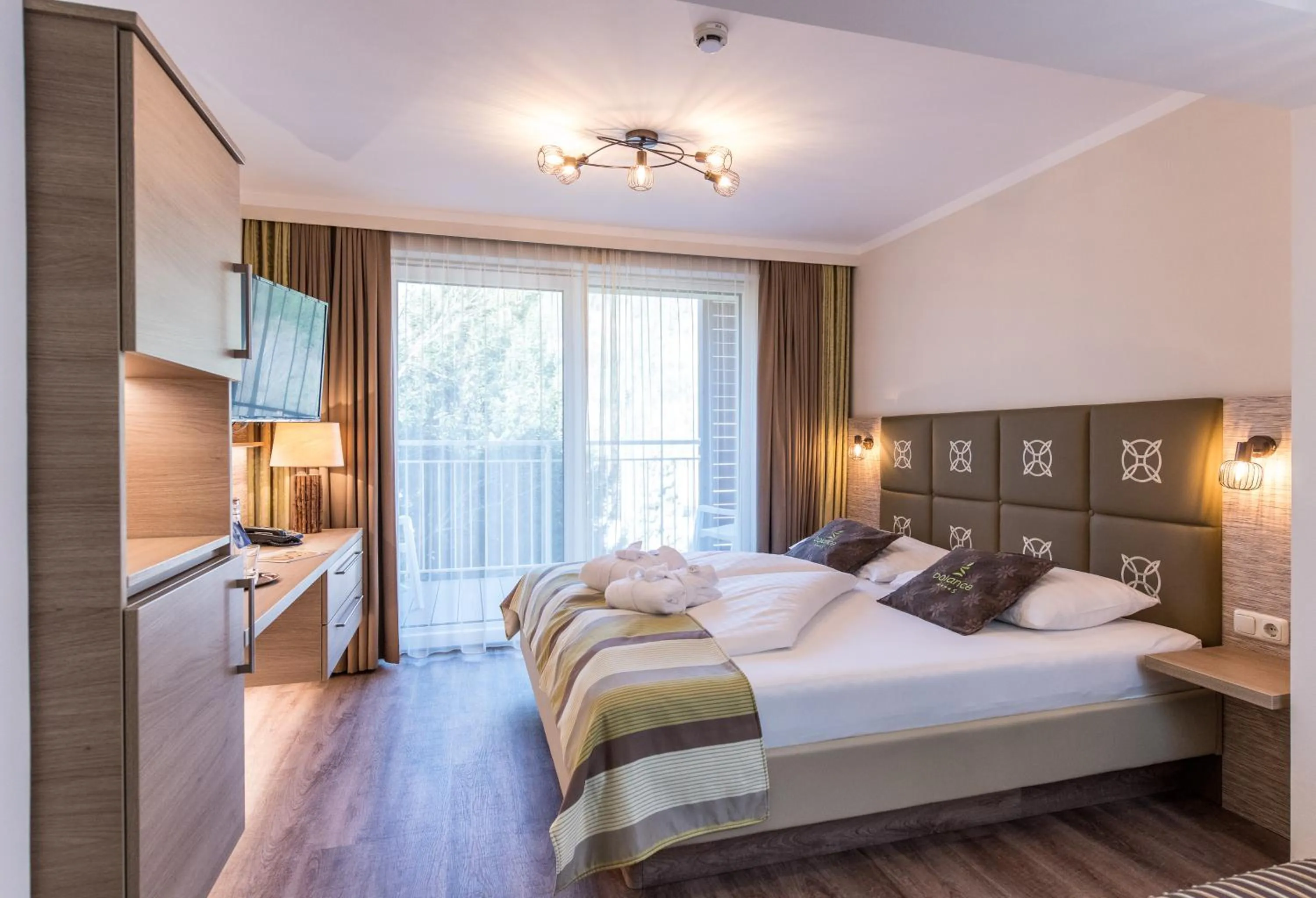 Photo of the whole room, Bed in das Balance - Spa & Golf Hotel am Wörthersee