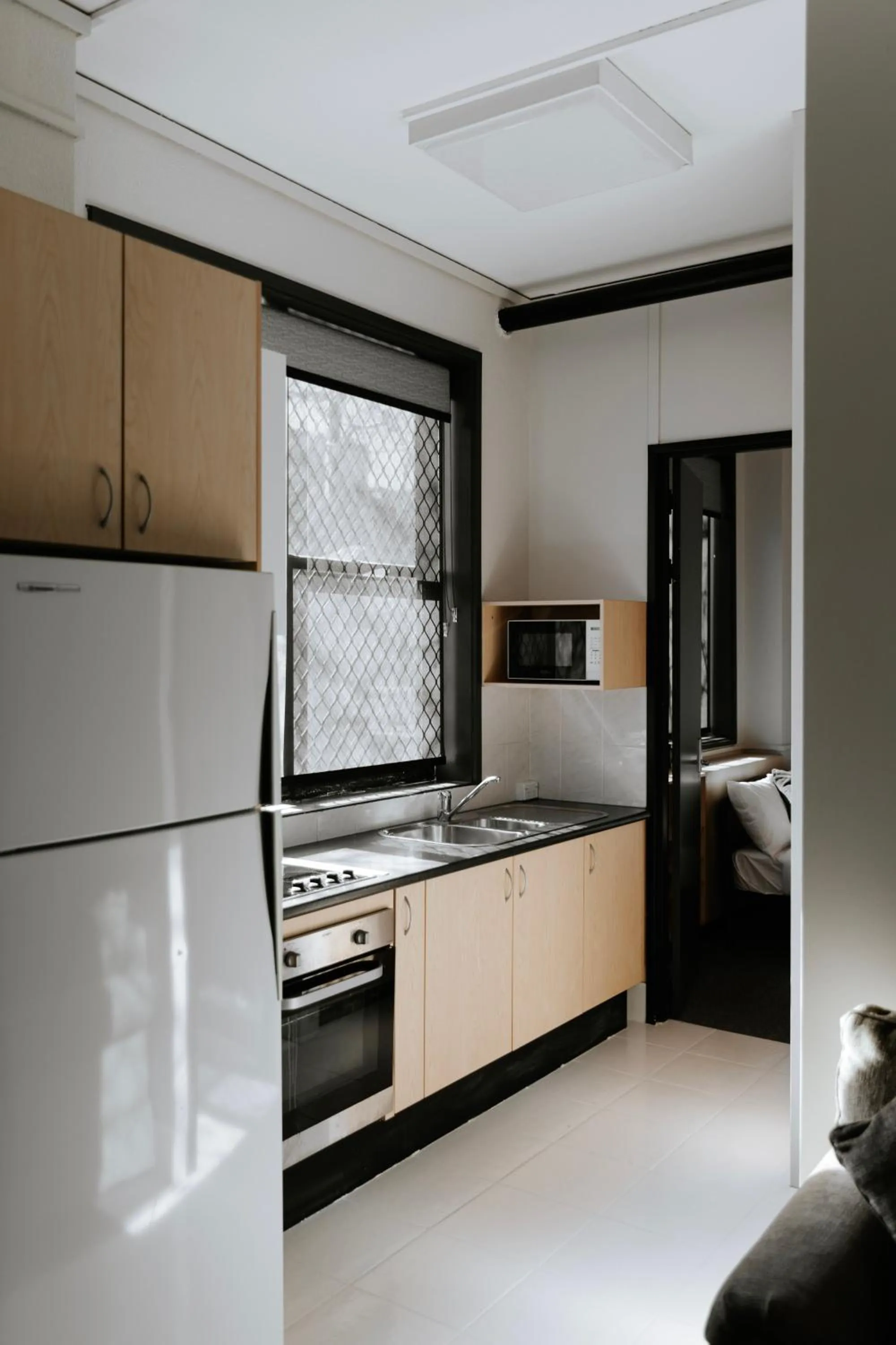 Kitchen or kitchenette in Canberra Accommodation Centre