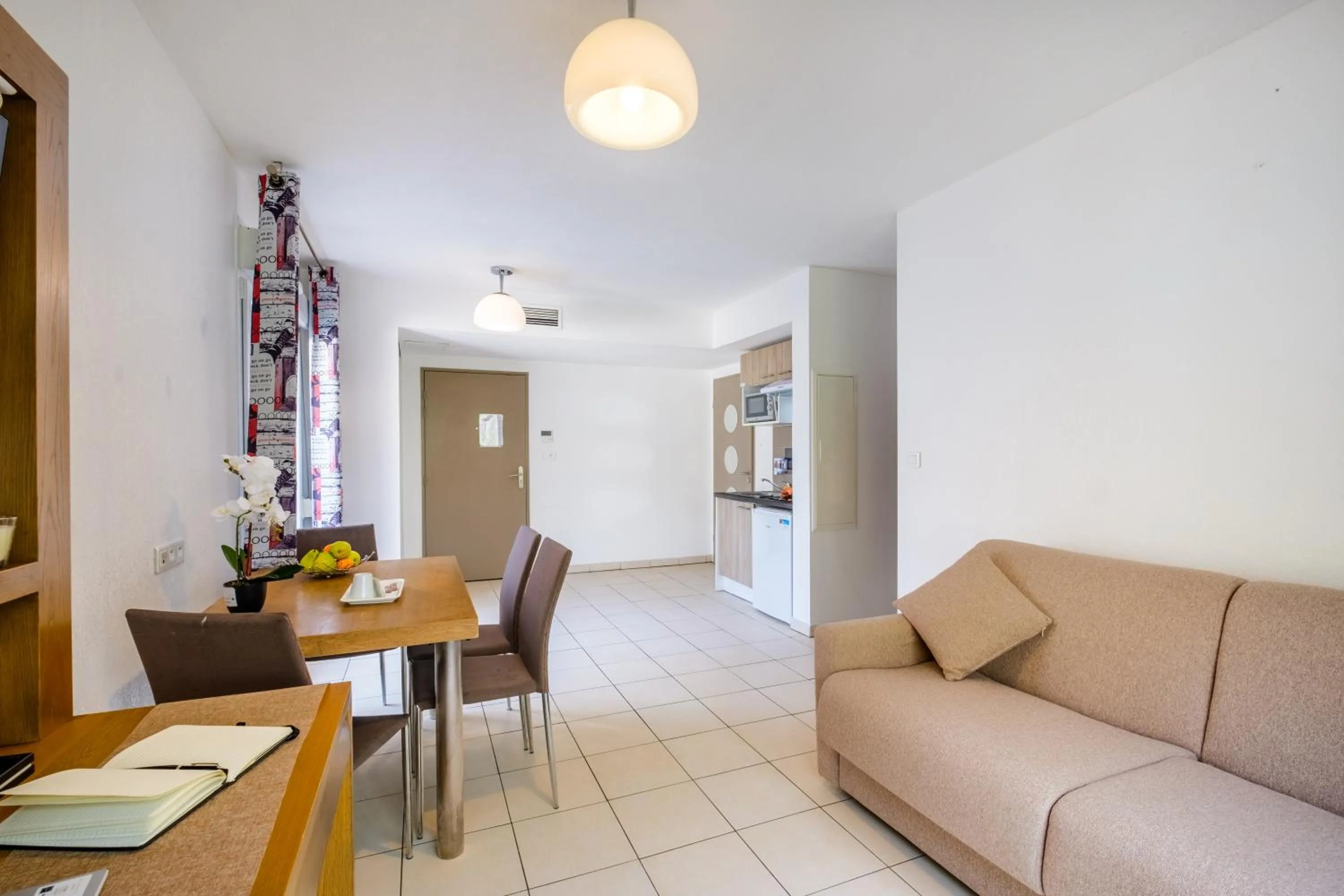 Living room in Comfort Aparthotel Antibes Le Maestria