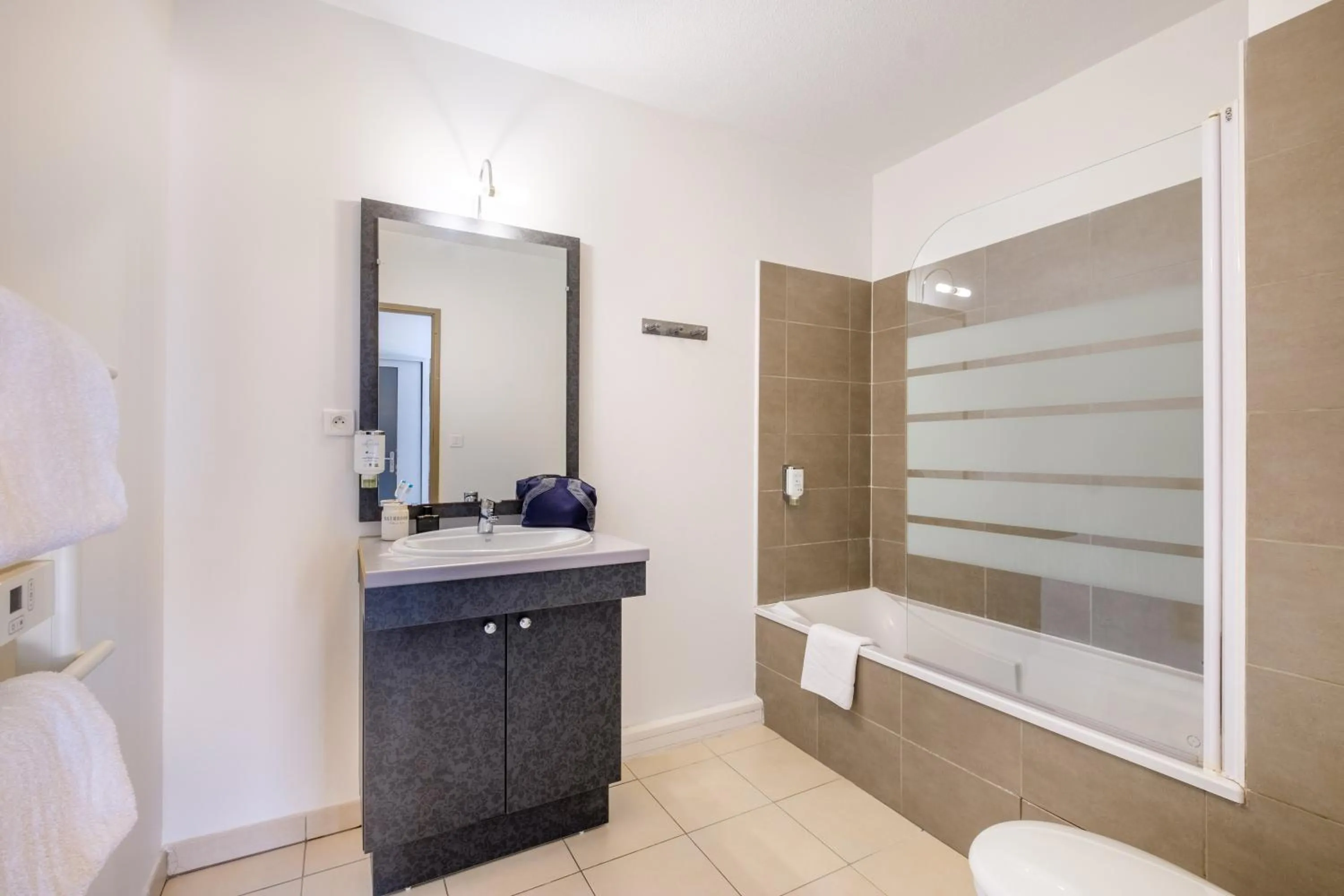 Bathroom in Comfort Aparthotel Antibes Le Maestria