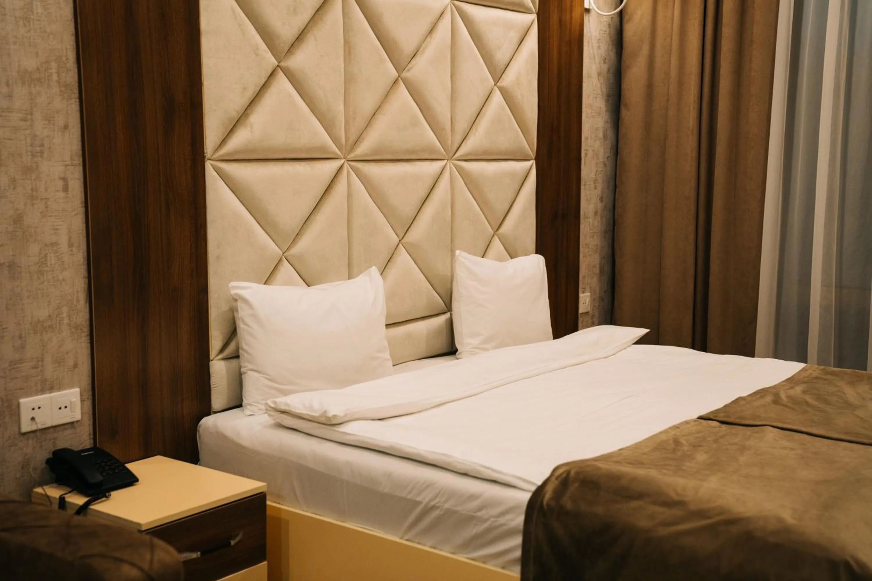 Bed in The Clocktower Hotel